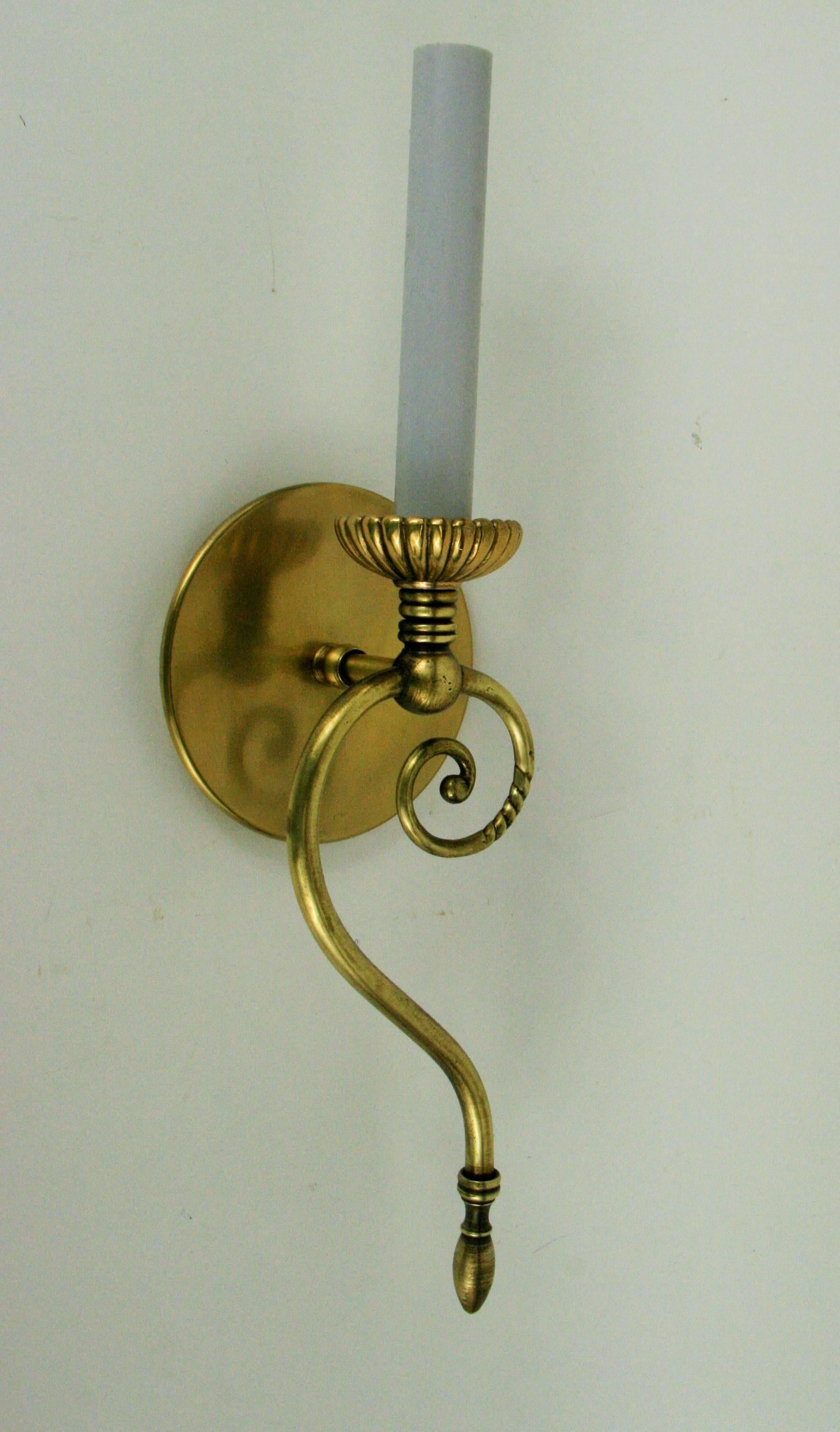 1-4077 a pair of swirled brass single light sconce.
Newly rewired.