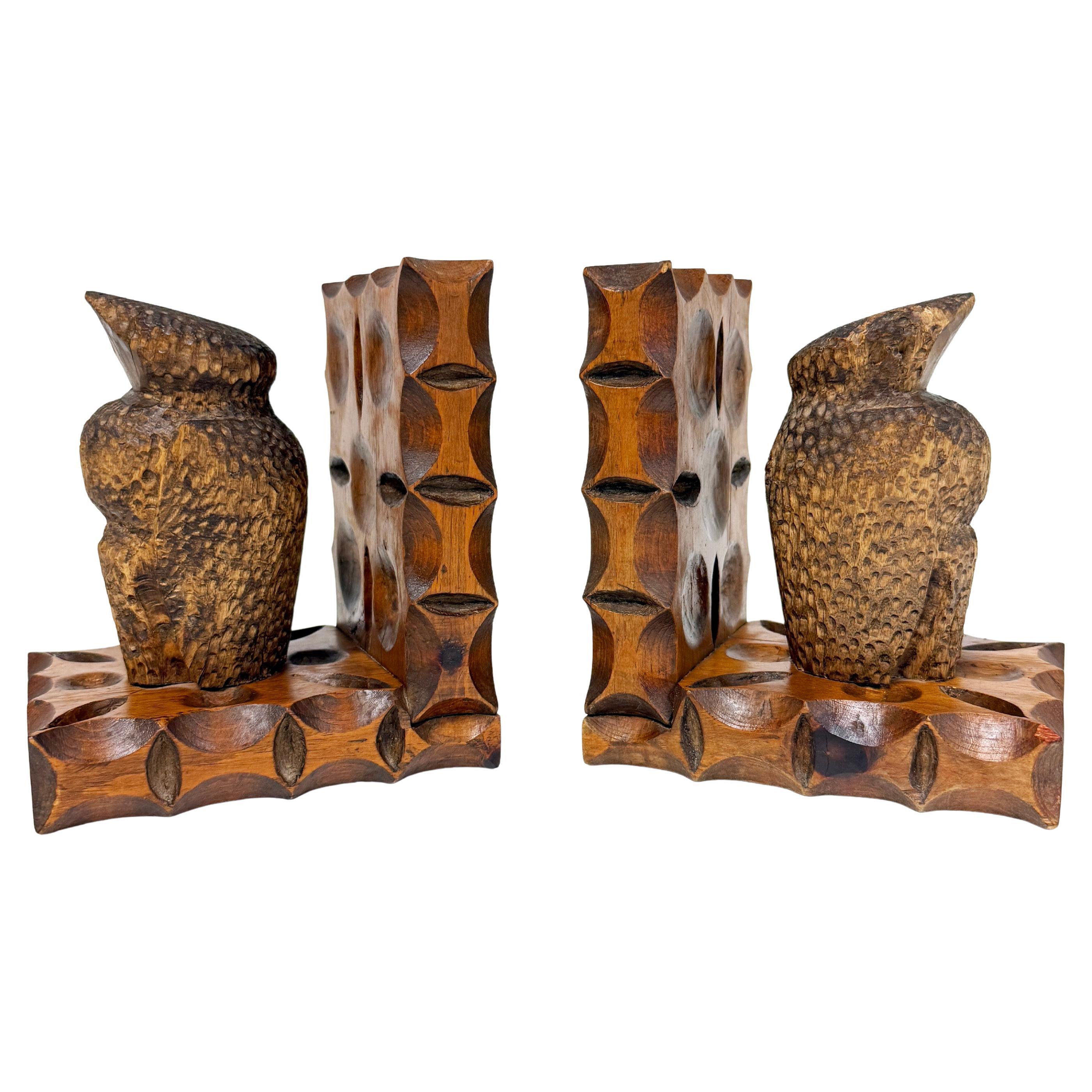 Fabulous pair of hand carved Swiss Brutalist book ends dating from the 1960's. Believed to originate from the renowned Swiss lakeside wood carving town of Brienz.
Solid carved wooden stylized owl / bird of prey carvings on a typical brutalist style