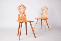 Pair of Swiss alp escabelle dated 1874
