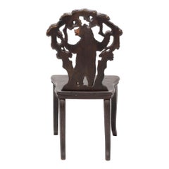 Pair of Swiss Black Forest Hand-Carved Chairs