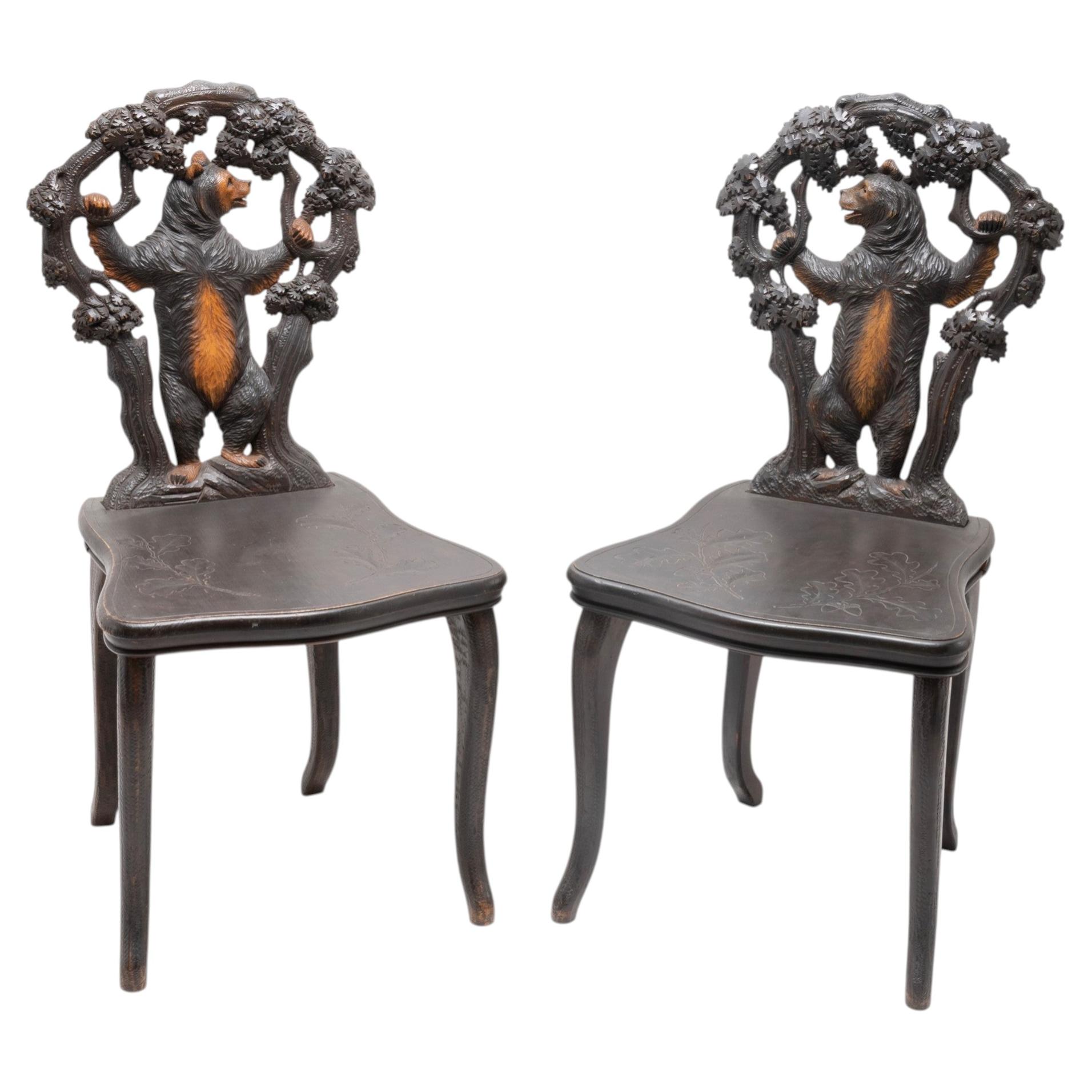 Pair of Swiss Black Forest Hand-Carved Chairs