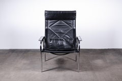Pair of Swiss Reclining Black Leather and Chrome Strässle Chairs by Eichenberger
