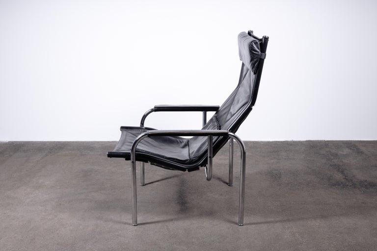 Steel Pair of Swiss Reclining Black Leather and Chrome Strässle Chairs by Eichenberger For Sale