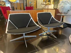 Pair of swivel armchairs by Fritz Hansen