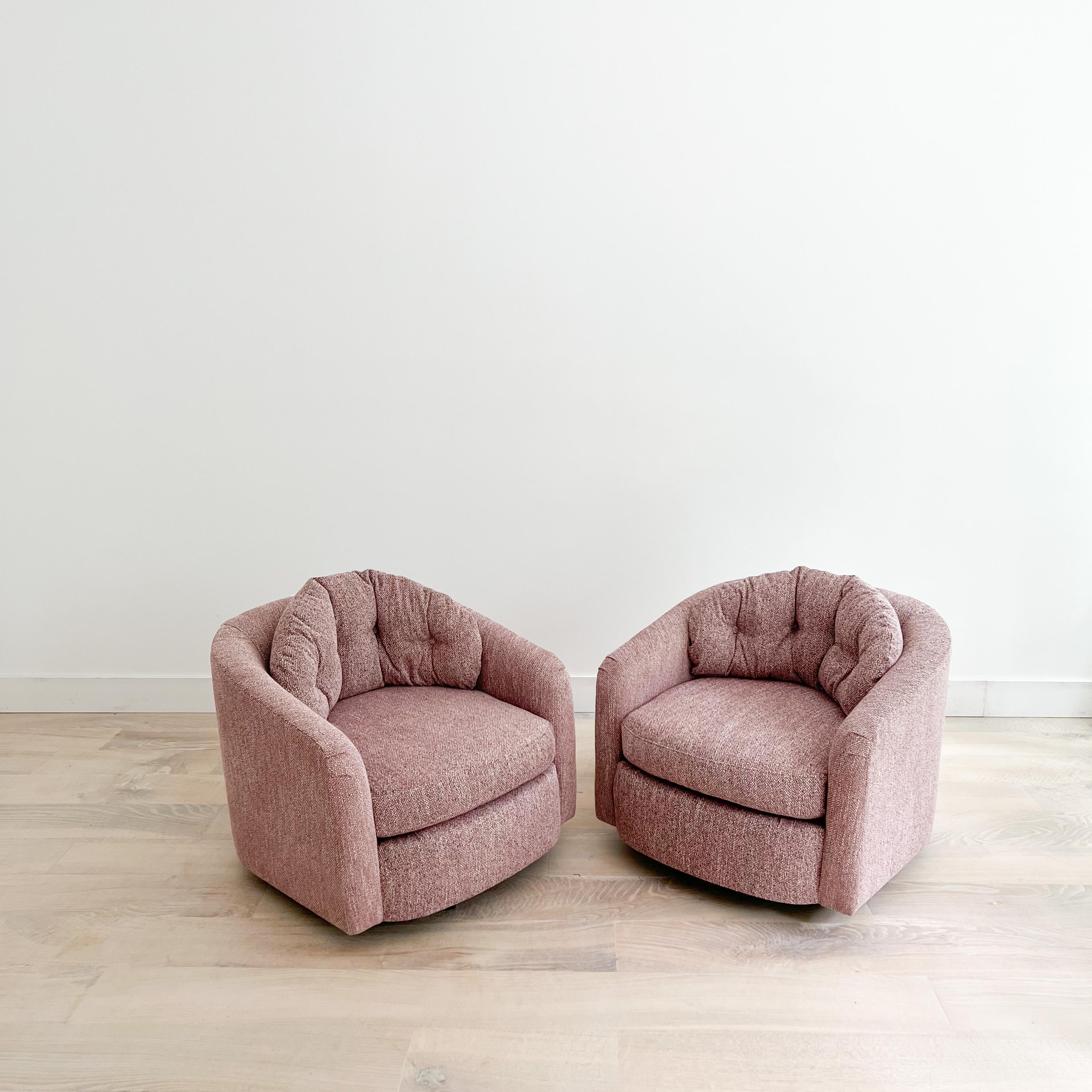 Pair of swivel back barrel lounge chairs with tufted back cushions. New mauve tweed upholstery. These swivel well and are ready for use!
