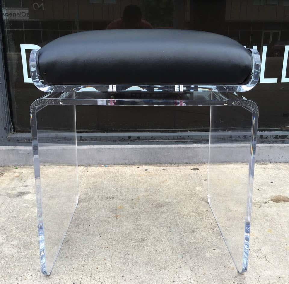 Beautiful pair of molded waterfall style benches designed by Charles Hollis Jones and manufactured by Hudson-Rissman.
The benches are in excellent original condition, the seat is upholstered in black vinyl.

The swivel mechanism is smooth and