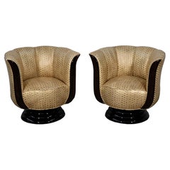 Pair of swivel chairs in gold-colored leather