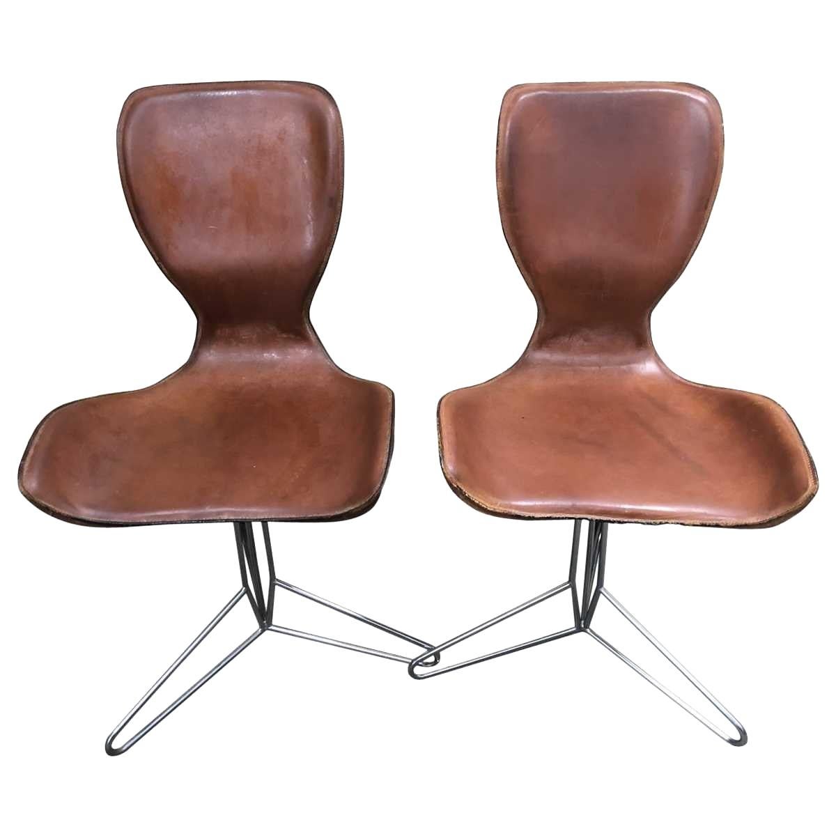 Pair of Swivel Chairs in the style of Arne Jacobsen