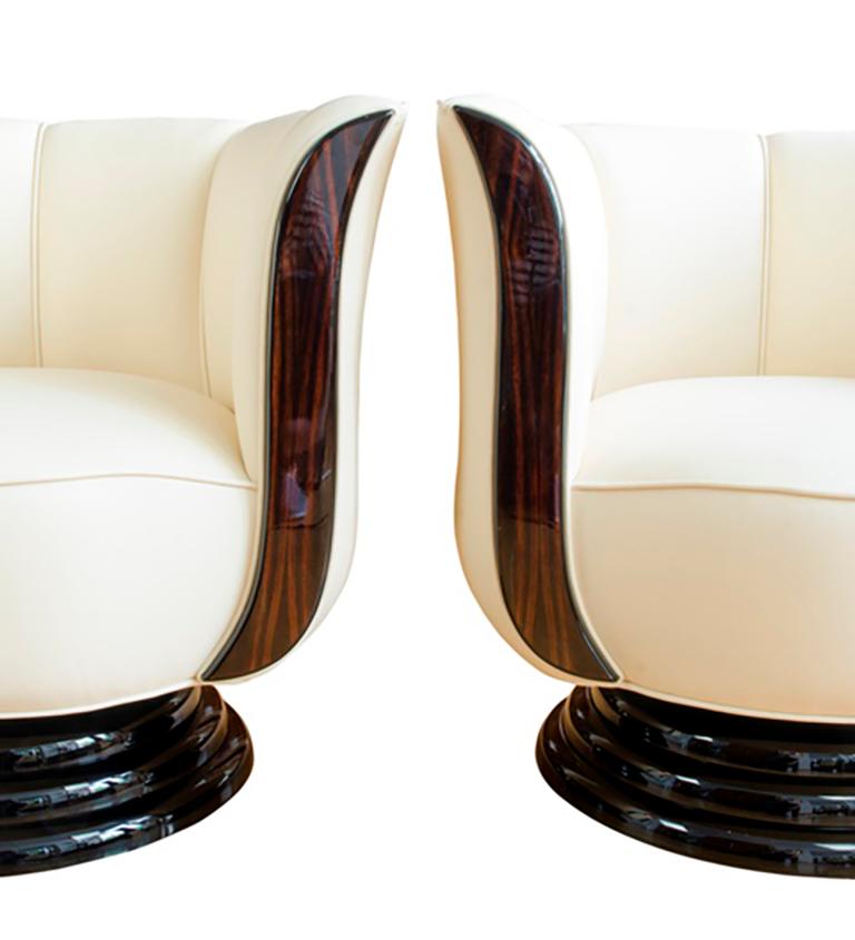 Art Deco Pair of swivel chairs upholstered in light leather For Sale