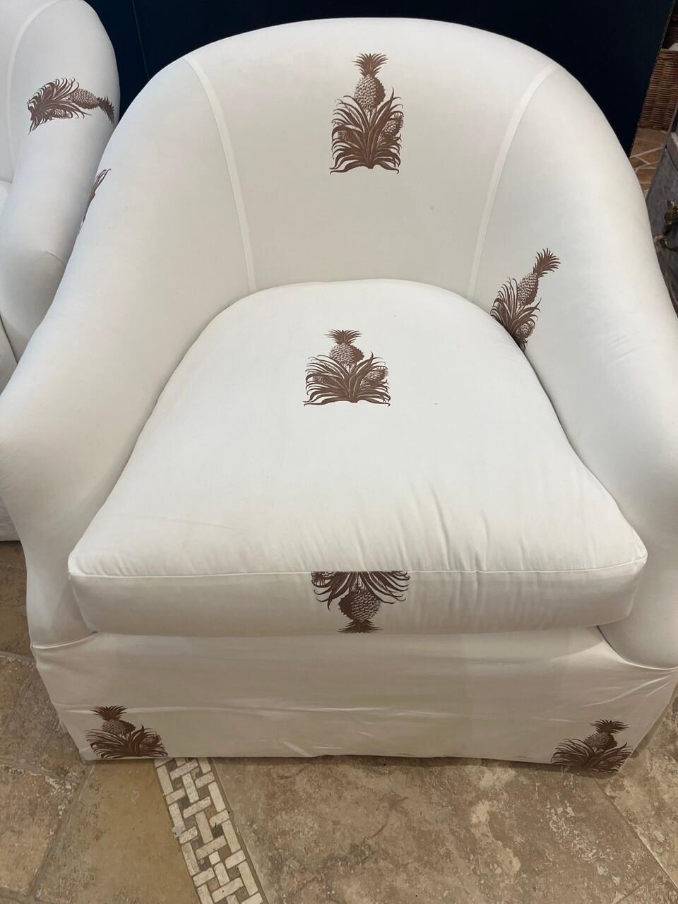 Nice pair of newly upholstered swivel club chairs 