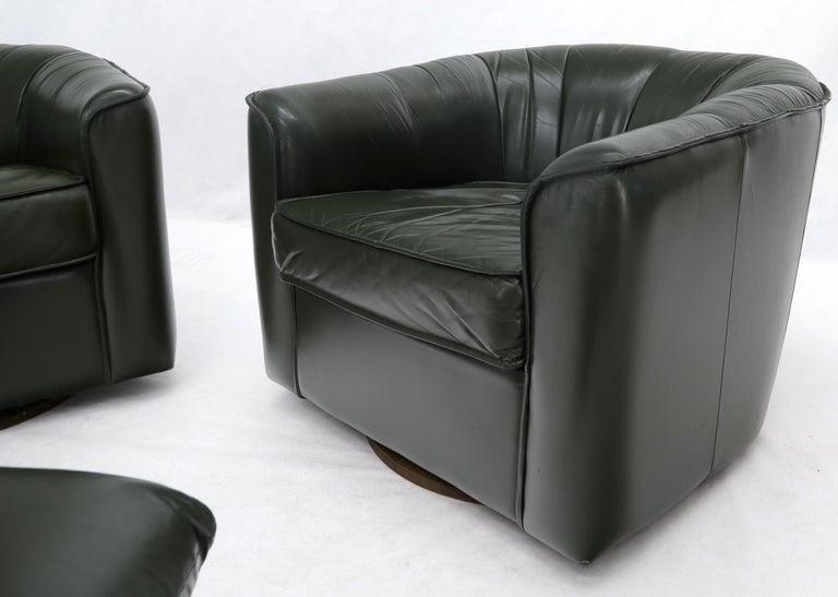 Pair of Swivel Dark Olive Green Leather Upholstery Lounge Chairs with