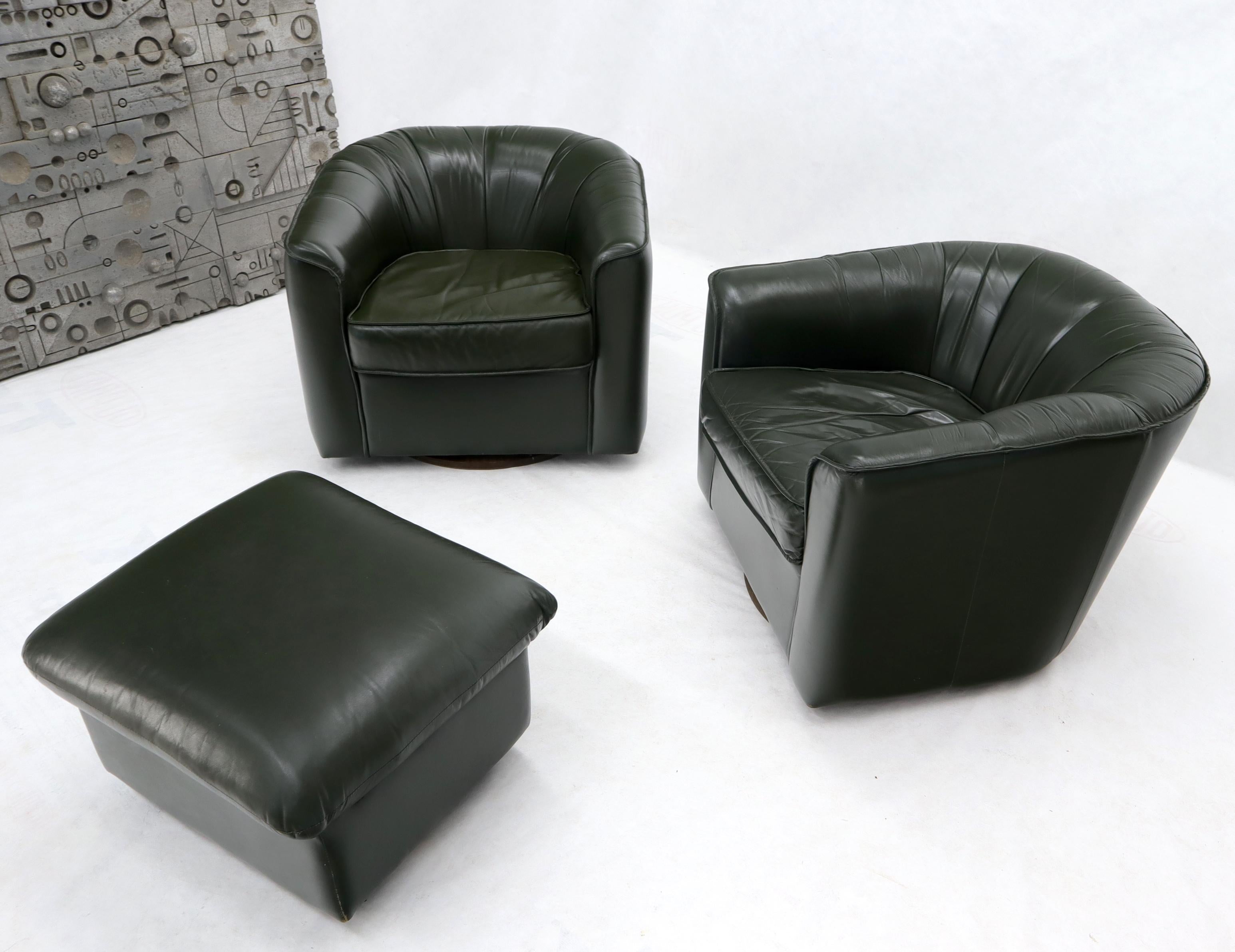 dark green chair and ottoman