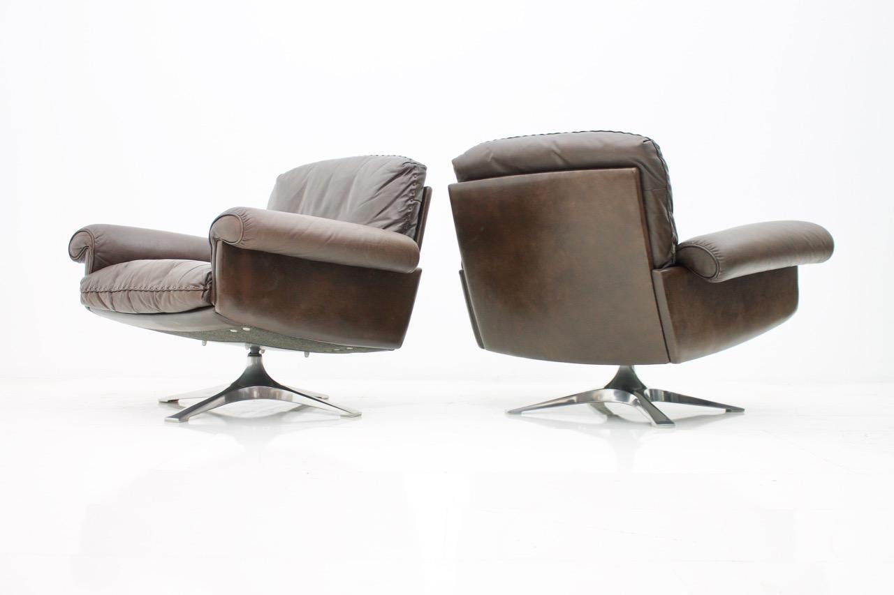 Mid-Century Modern Pair of Swivel Leather Lounge Chairs DS 31 by De Sede, 1970s