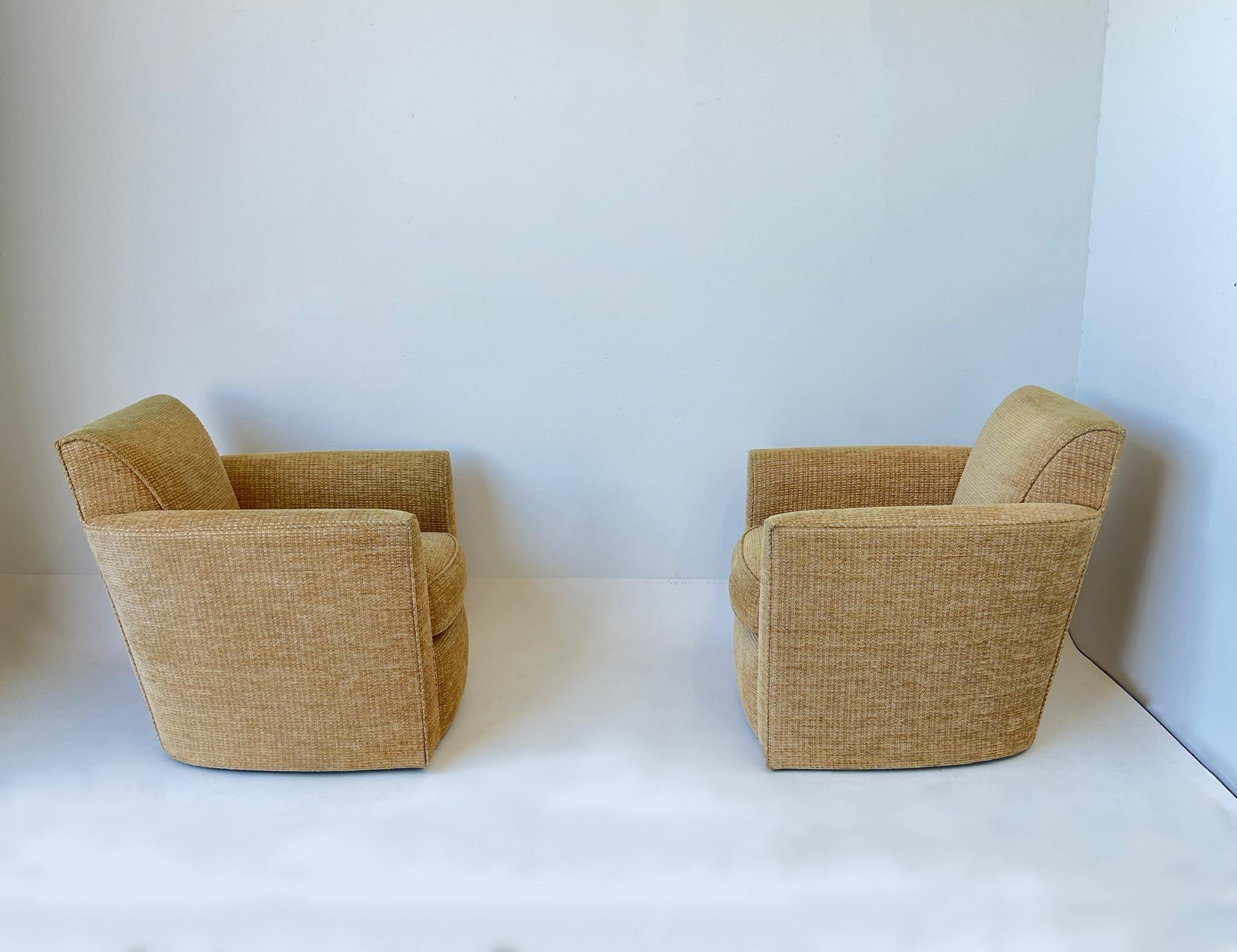 Modern Pair of Swivel Lounge Chairs and Ottoman by Donghia