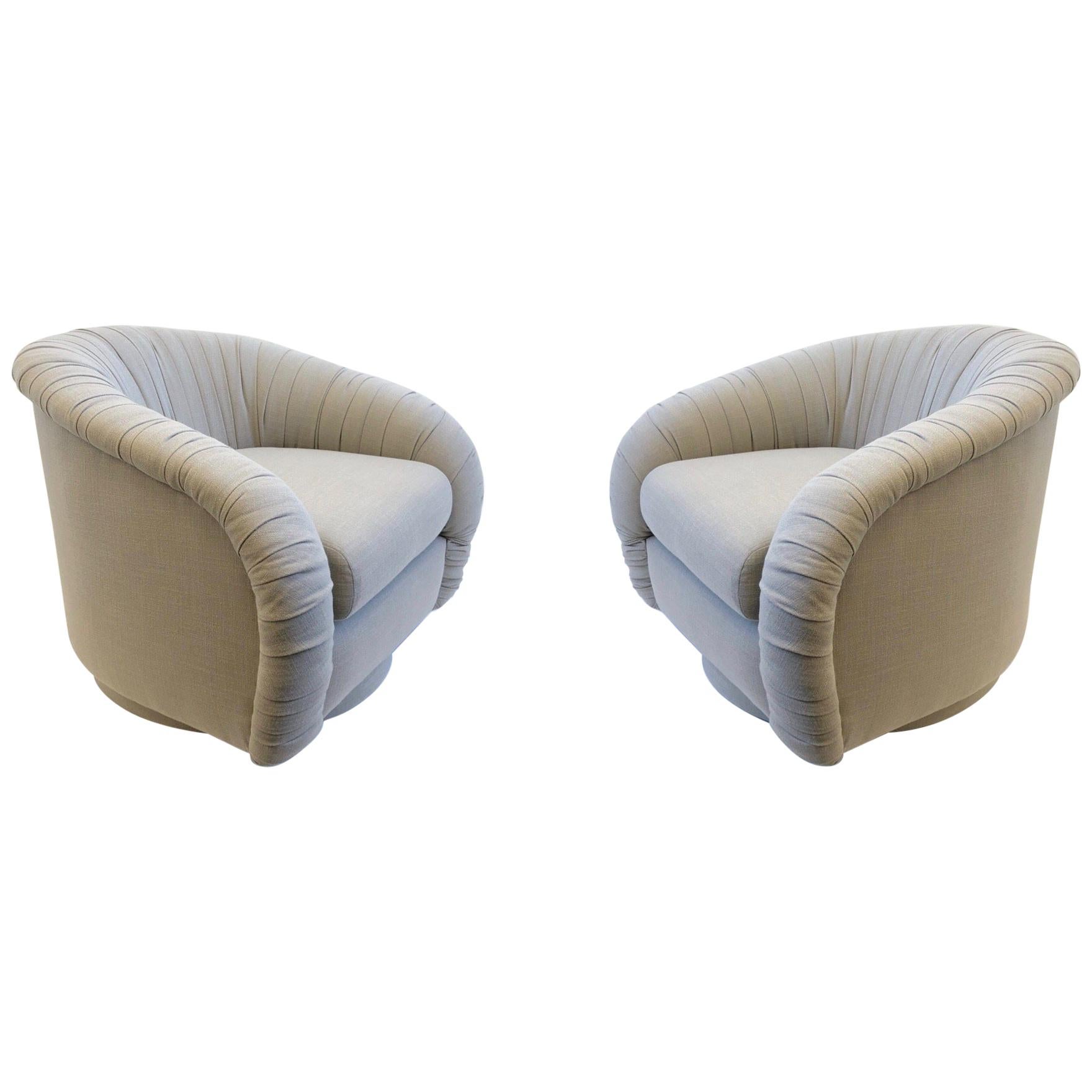 Pair of Swivel Lounge Chairs in the Manner of Milo Baughman