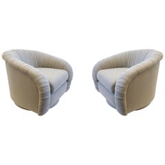 Pair of Swivel Lounge Chairs in the Manner of Milo Baughman