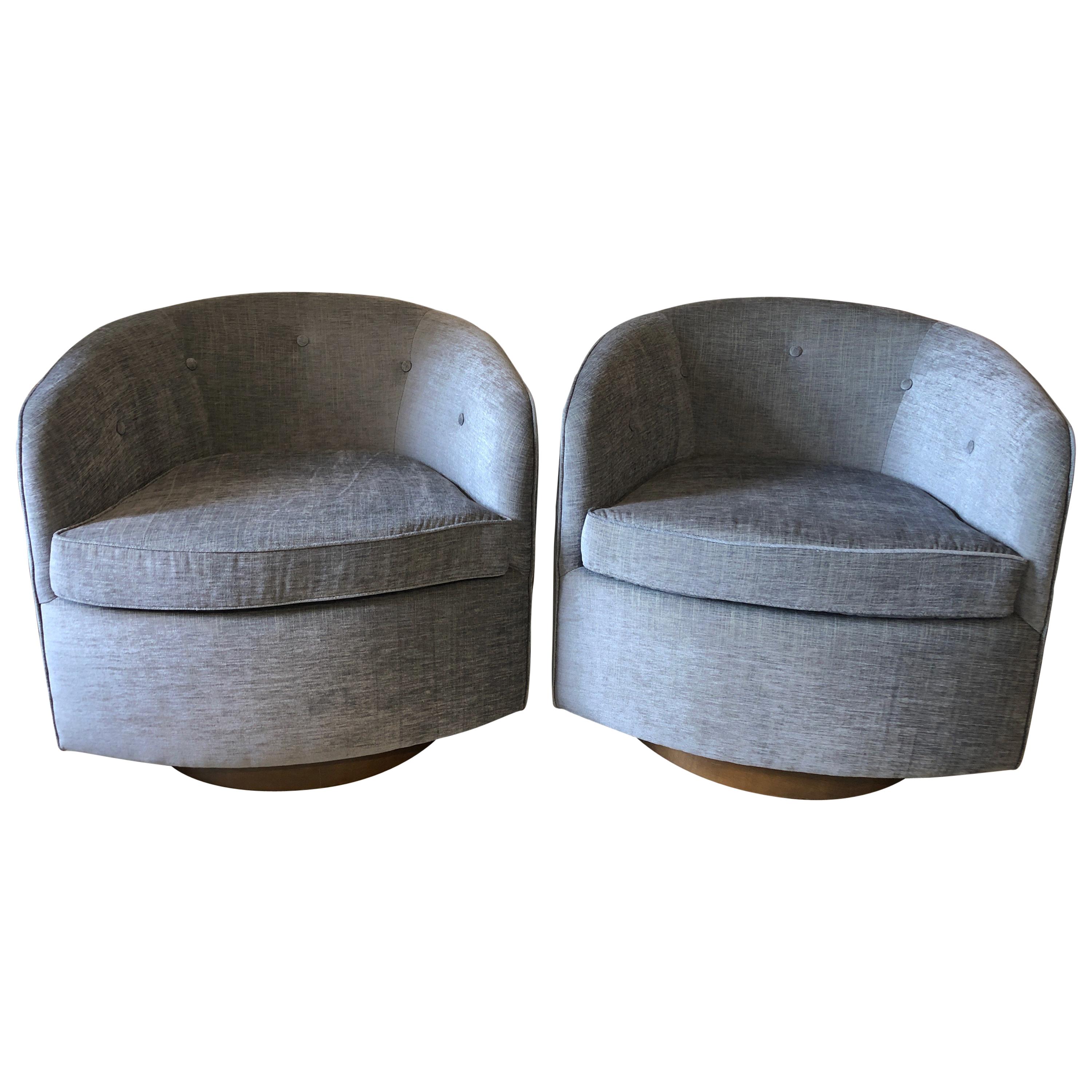 Pair of Swivel Lounge Chairs on Walnut Base For Sale