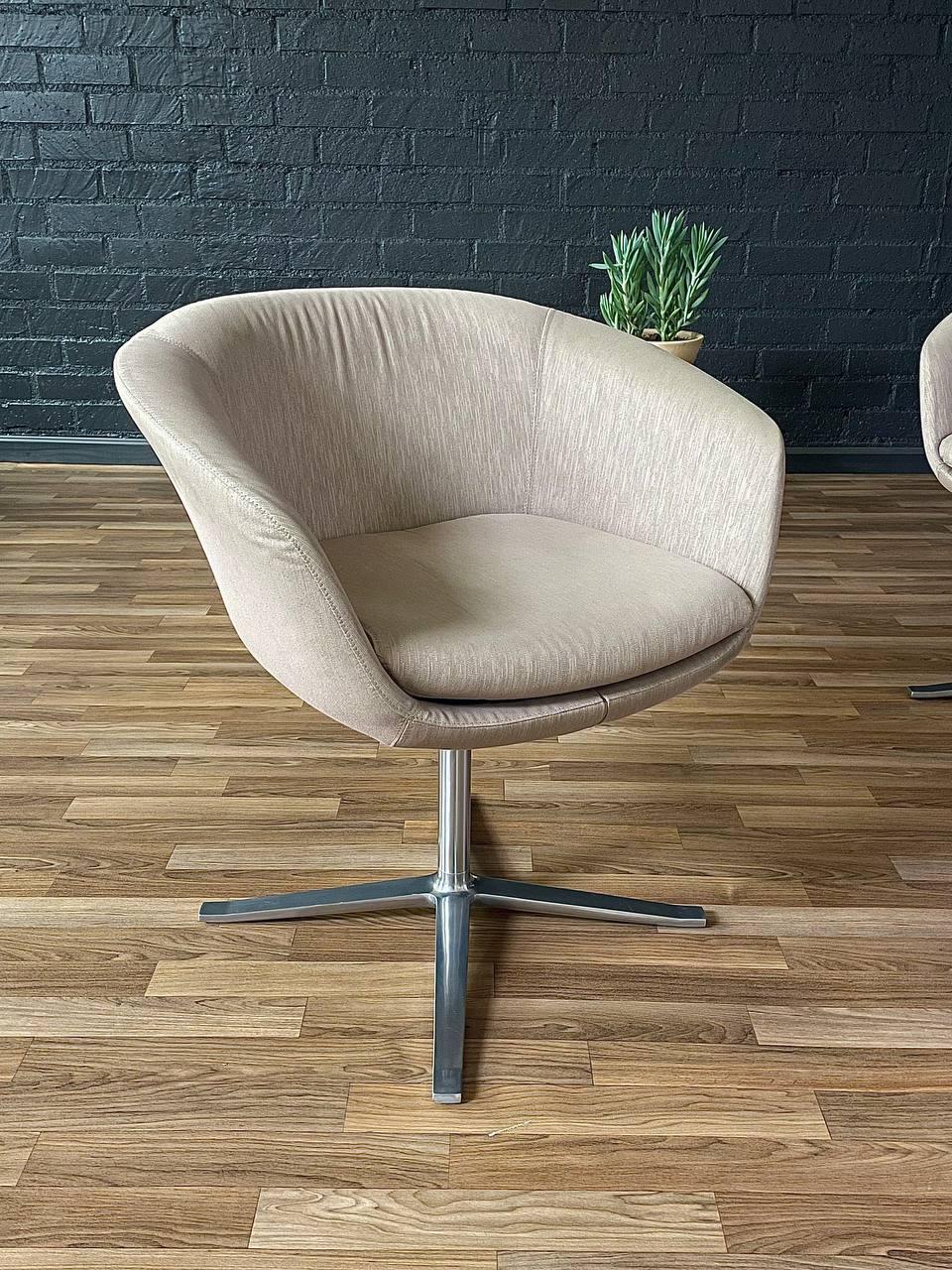 American Pair of Swivel Steel Pod Chairs by Pearsan Lloyd