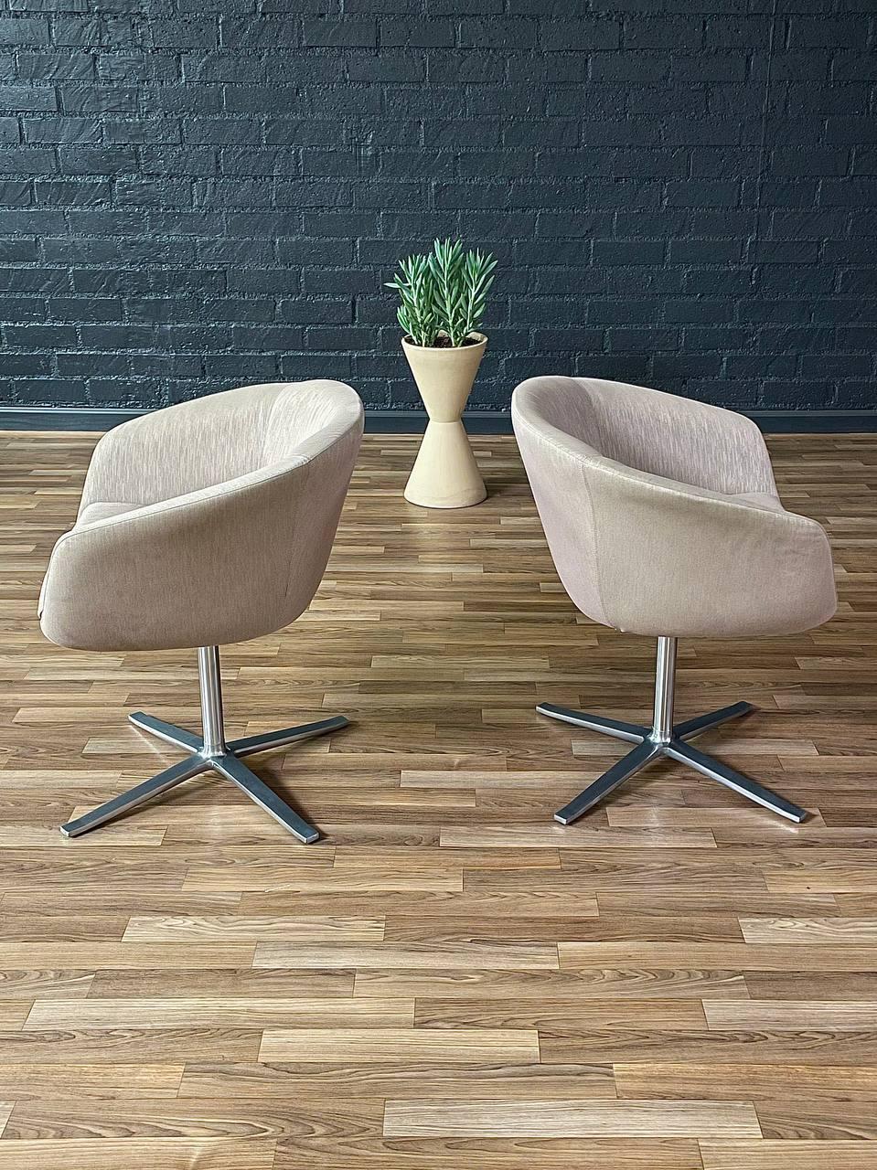 Stainless Steel Pair of Swivel Steel Pod Chairs by Pearsan Lloyd