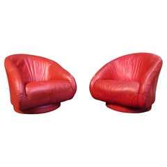 Pair of Swiveling Red Club Chairs