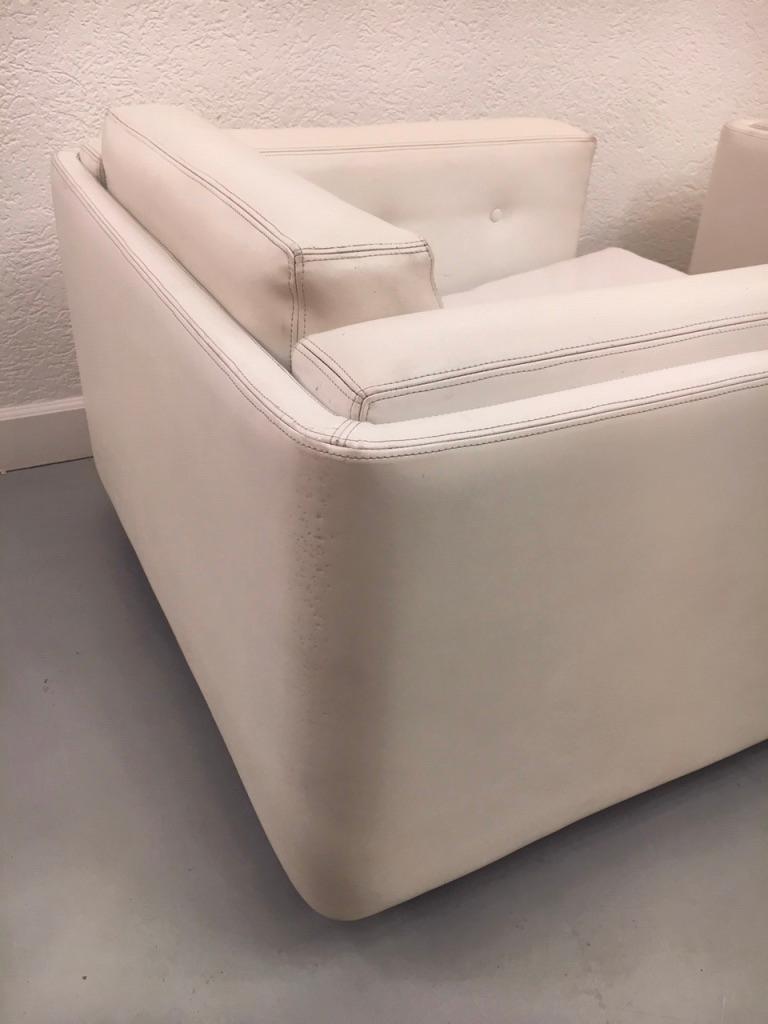 Pair of Swiveling White Faux Leather 