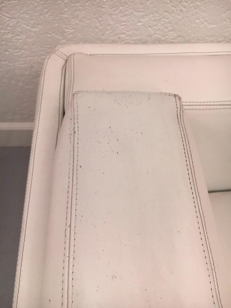 Pair of Swiveling White Faux Leather 