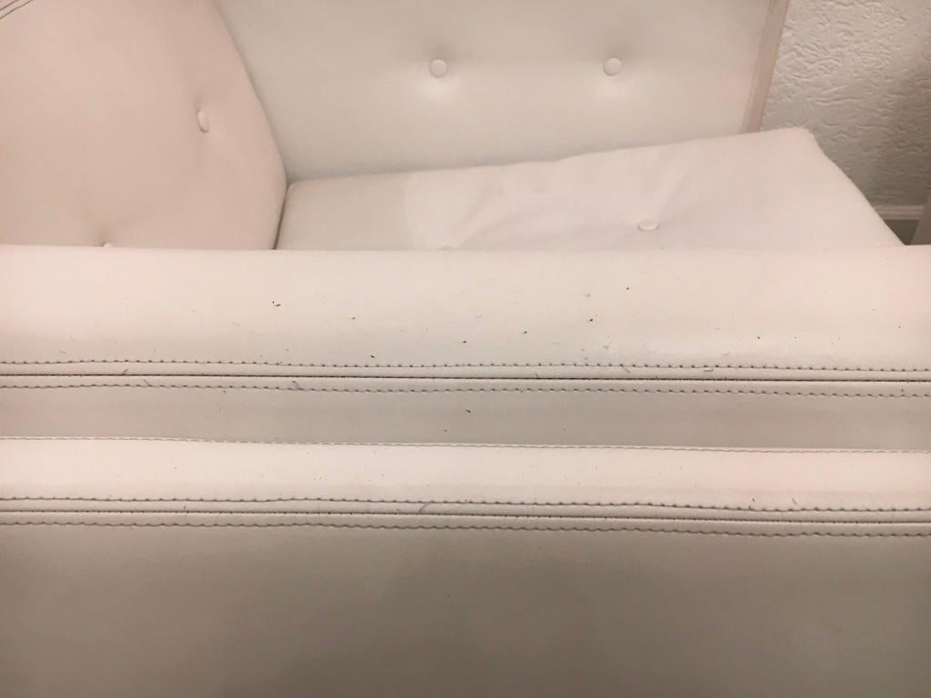 Pair of Swiveling White Faux Leather 