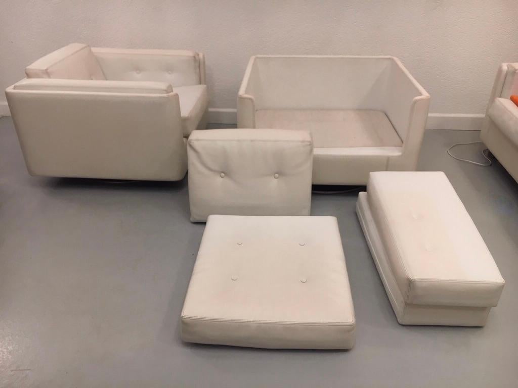 Pair of Swiveling White Faux Leather 