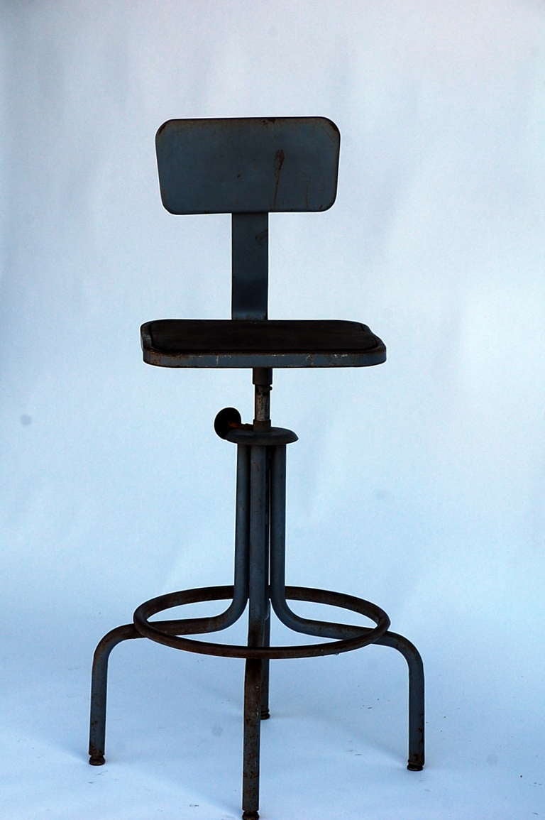 Pair of Swiveling Workshop Bar Stools In Fair Condition In Los Angeles, CA