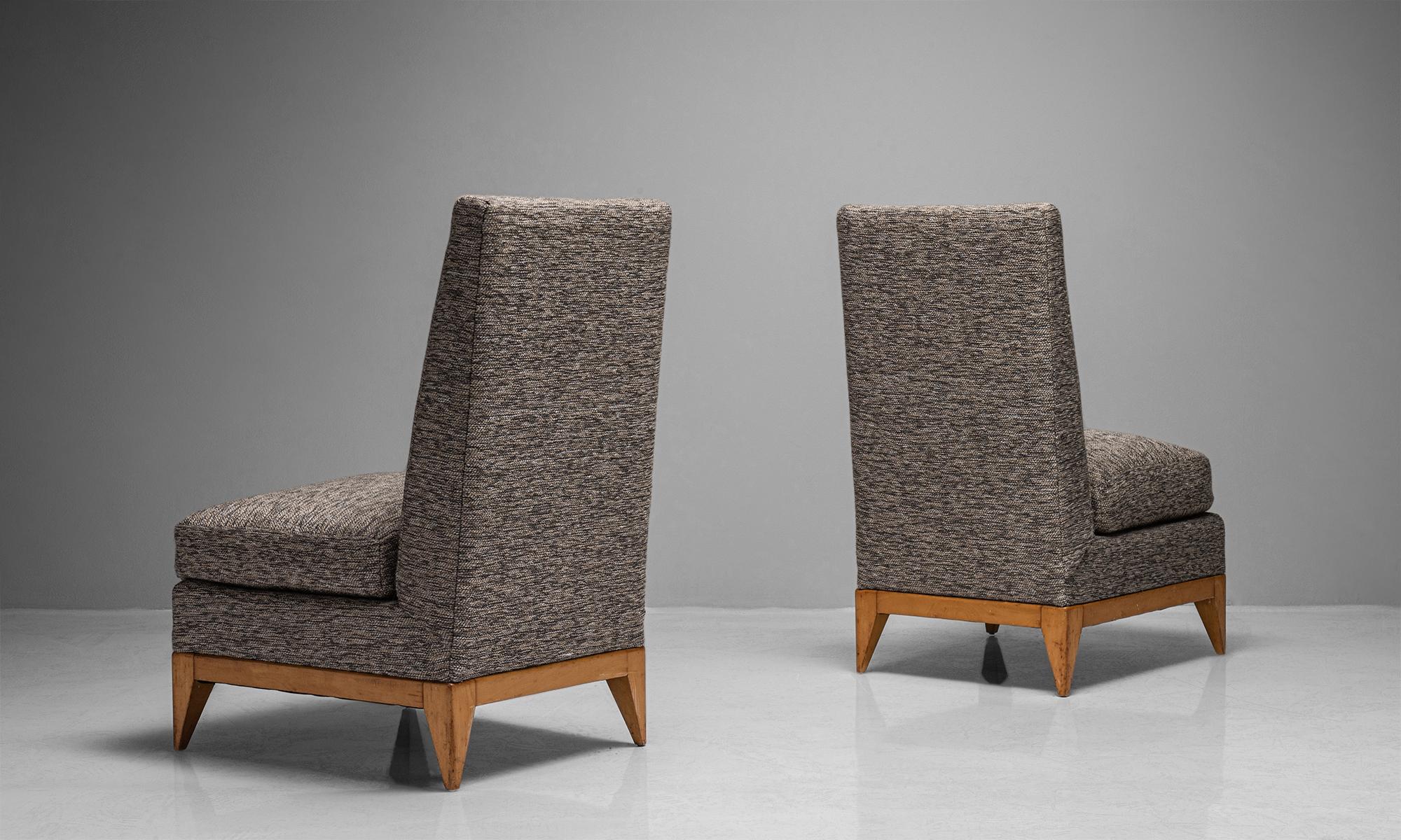 Pair of Sycamore upholstered slipper chairs, France, circa 1950

Newly upholstered with tapered back and sycamore legs and apron below.

Measures: 20.5