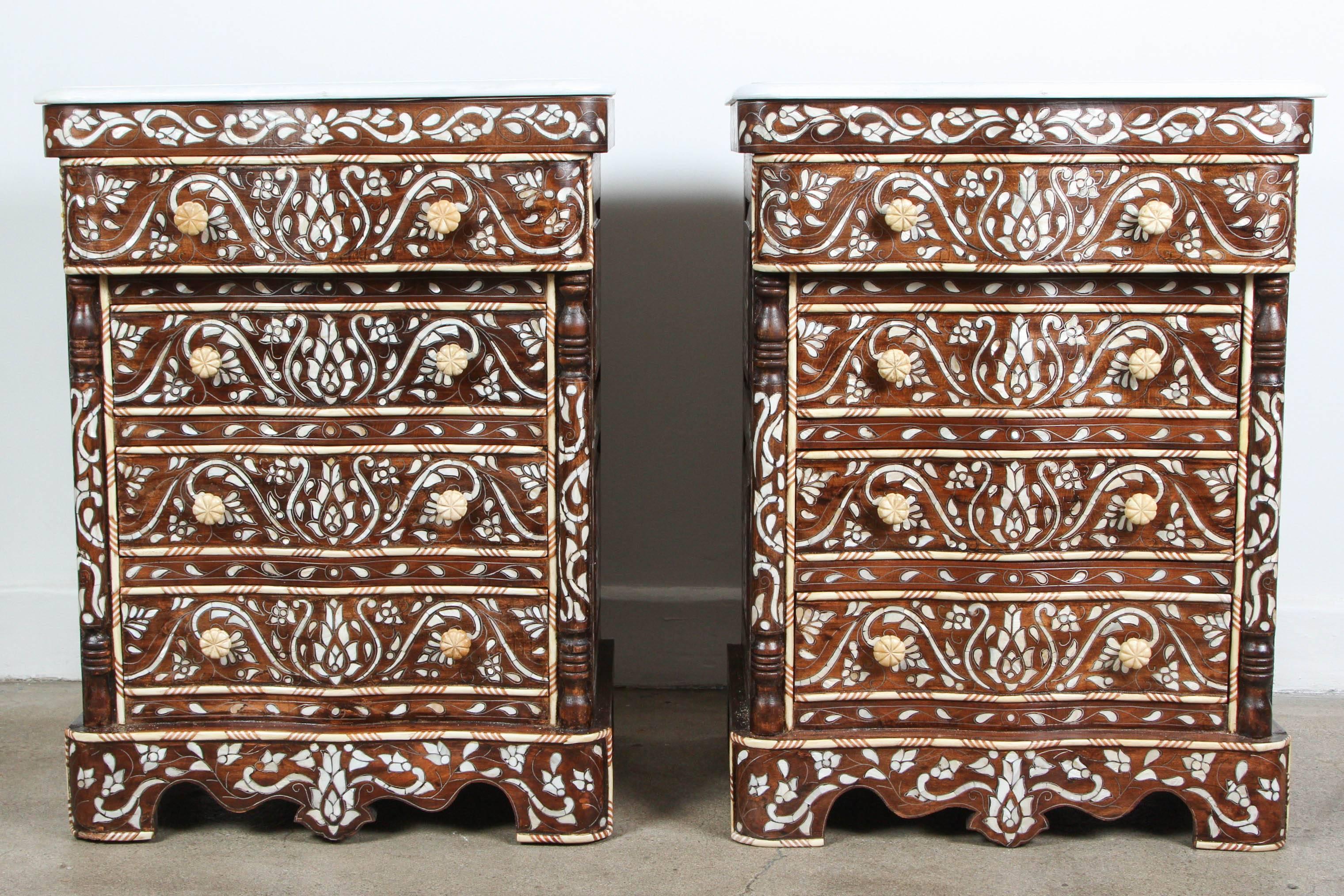 Fabulous pair of Middle Eastern Syrian mother of pearl inlay nightstands.
Handcrafted wedding dresser with four drawers, wood inlay with mother of pearl, shell and bone.
Moorish arches and intricate Islamic designs.
Dowry chest of drawers heavily