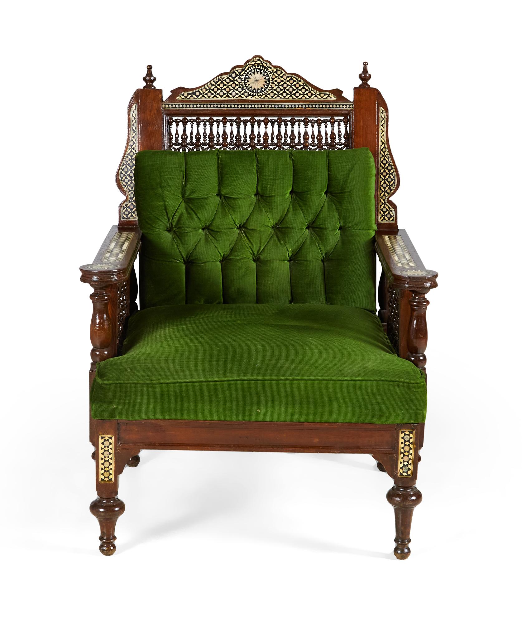 Pair of Middle Eastern Syrian-style (20th Century) armchairs in walnut with inlaid mother of pearl and ebony marquetry having emerald green tufted upholstery, with spindle and finial details (priced as pair).
  