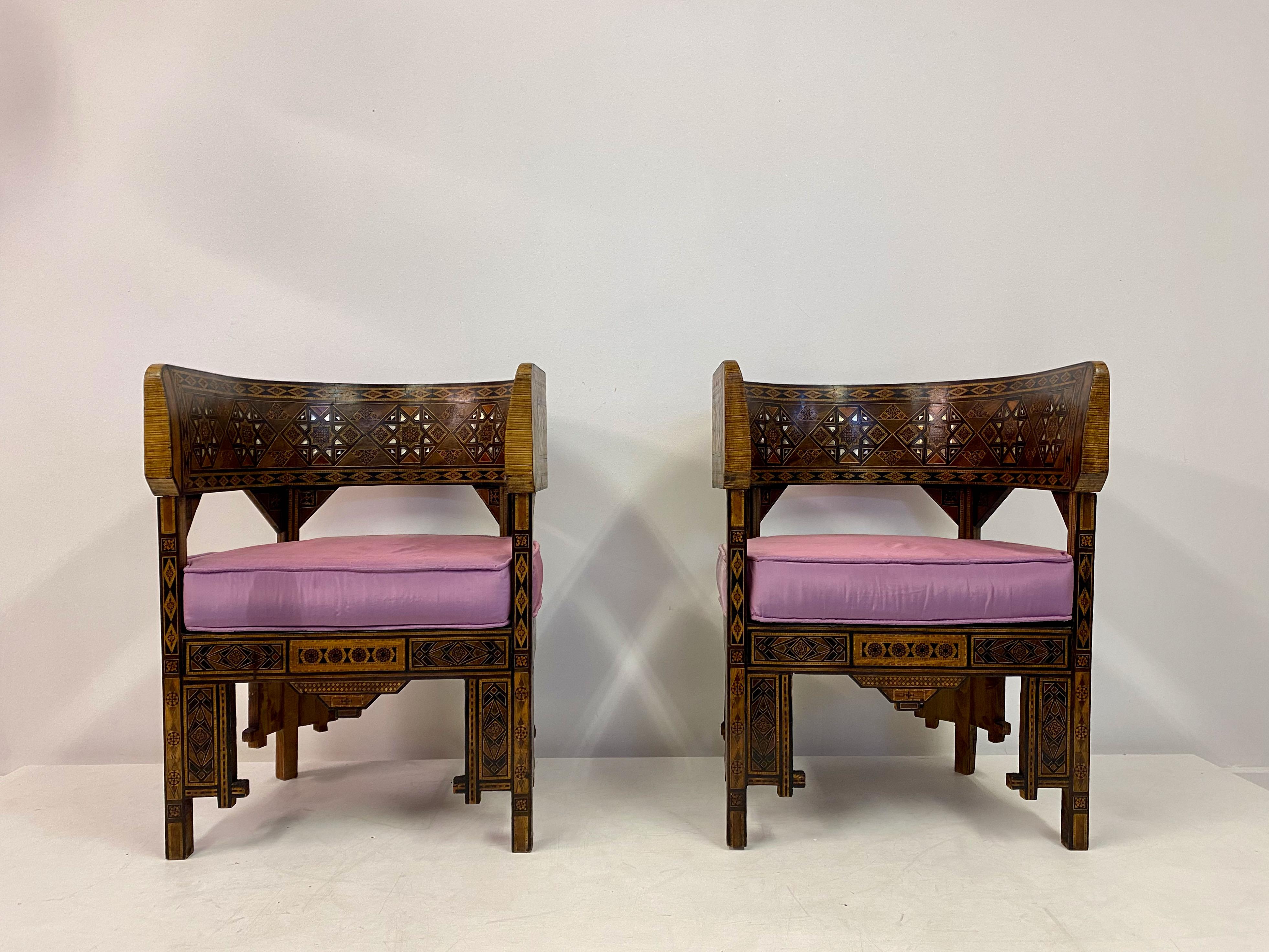 Pair of tub armchairs

Walnut with parquetry

Mother of pearl and fruitwood inlay

Geometric patterns

Silk covered cushions with some marks. 

Can be reupholstered if fabric supplied

Syria late 19th century.