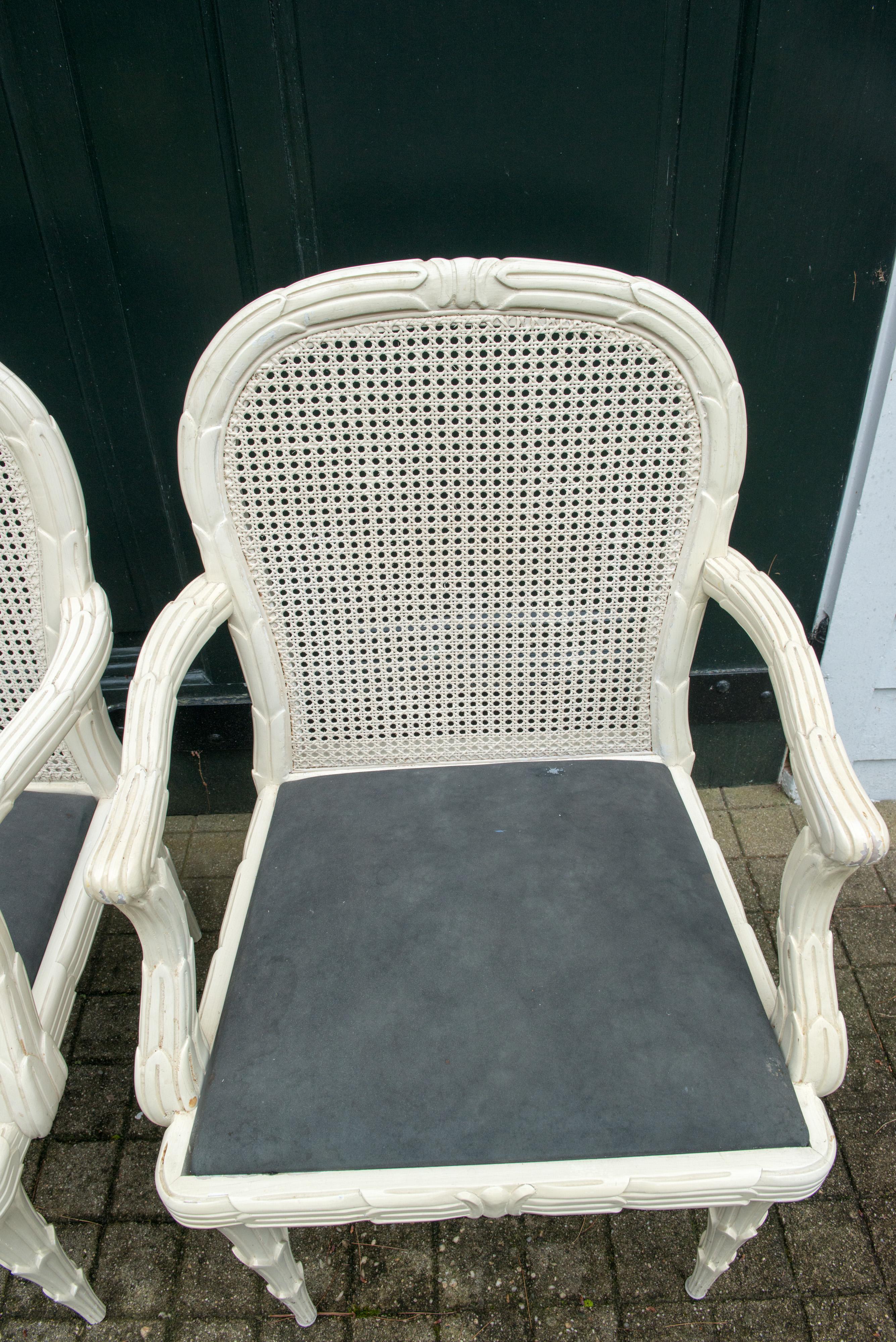 Unknown Pair of Syrie Maugham Style White Foliate Cane Back Arm Chairs For Sale