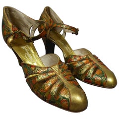 Pair of T-bar golden Salome shoes for the ball Circa 1930