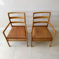Pair of T. H. Robsjohn Gibbings for Widdicomb Ladderback & Woven Rattan Seat Arm