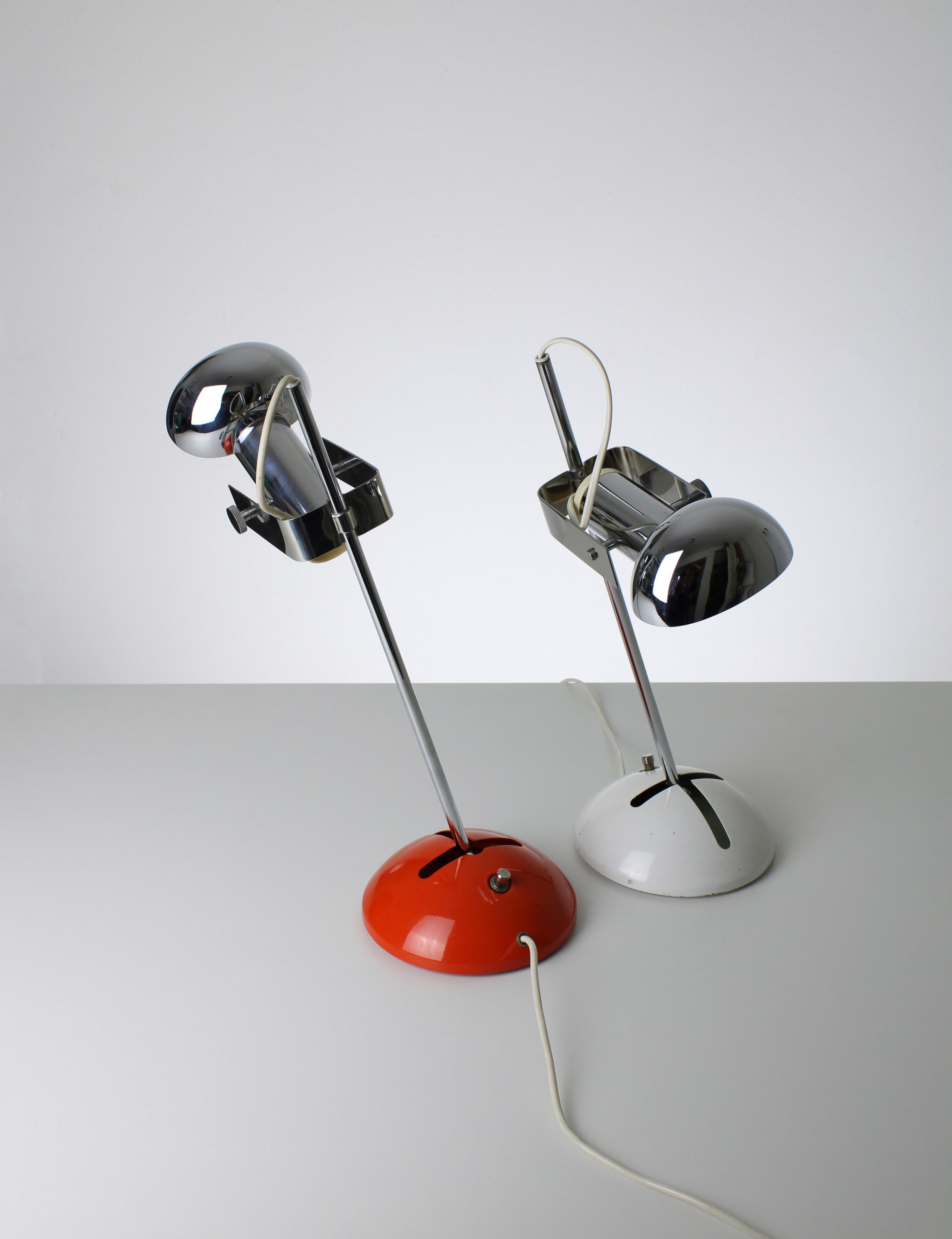 Set of two identical T359 desk lamps designed by Robert Sonneman for Luci Cinicello Milano in the 1970s. These lamps are adjustable in many ways and therefore very user-friendly. They feature a lacquered aluminum base, chrome parts and a custom