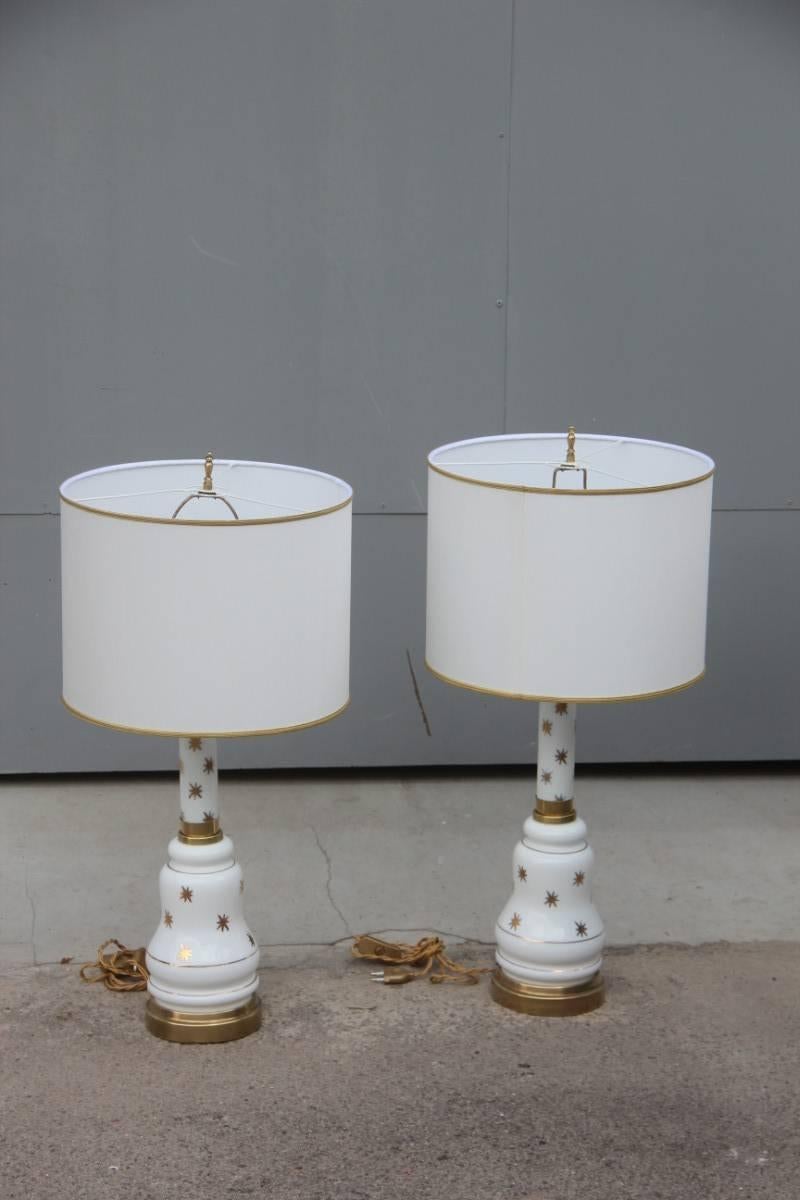Pair of elegant table lamp Italian design 1960s opaline glass with gold decorations and brass finishes, fabric dome, elegance and refinement for these two lamps.