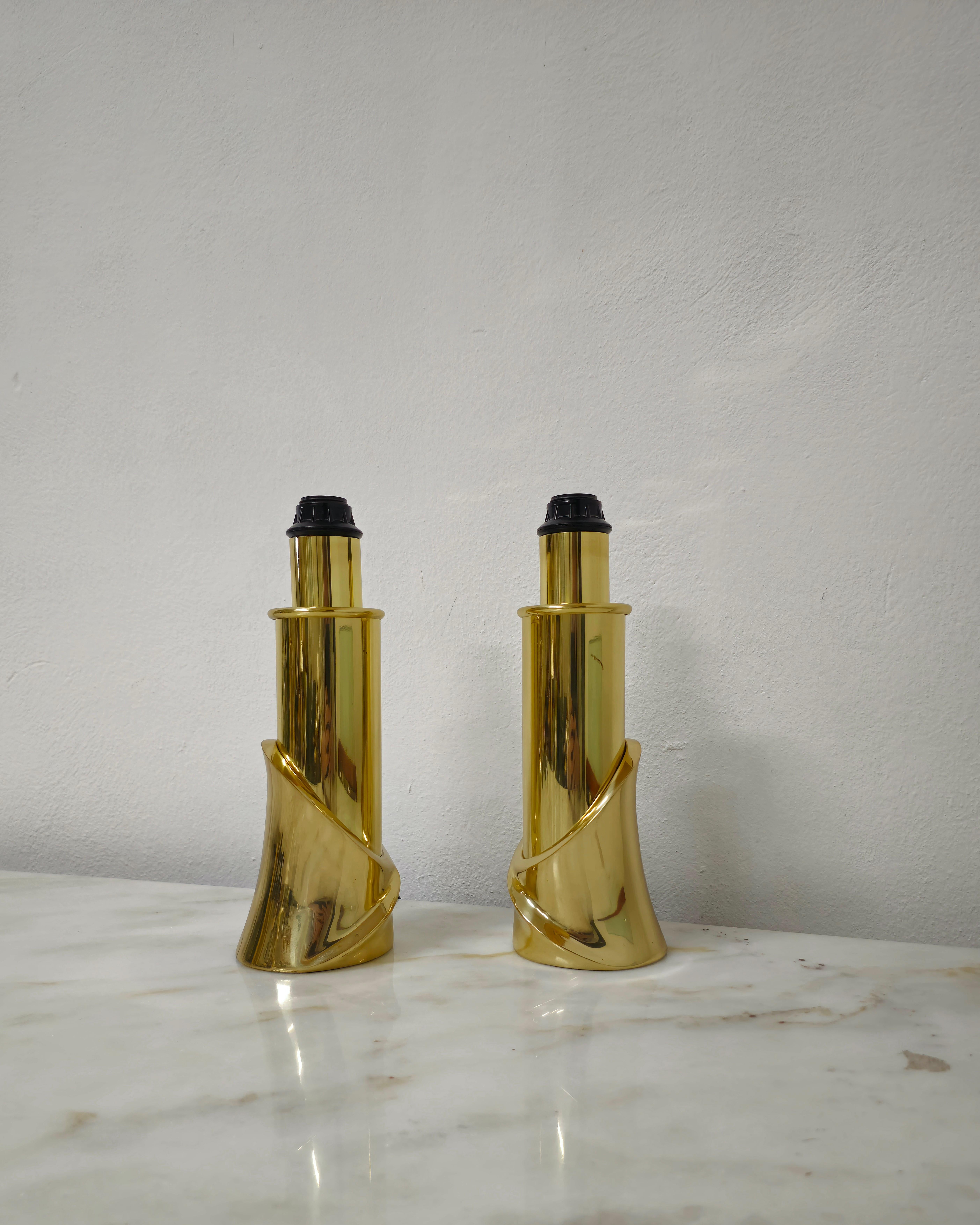 Amazing set of 2 bedside or table lamps designed by the renowned Italian designer Luciano Frigerio and produced in Italy in the 1970s. Each individual sculptural lamp with a particular shape was made of polished and solid brass.



Note: We try to