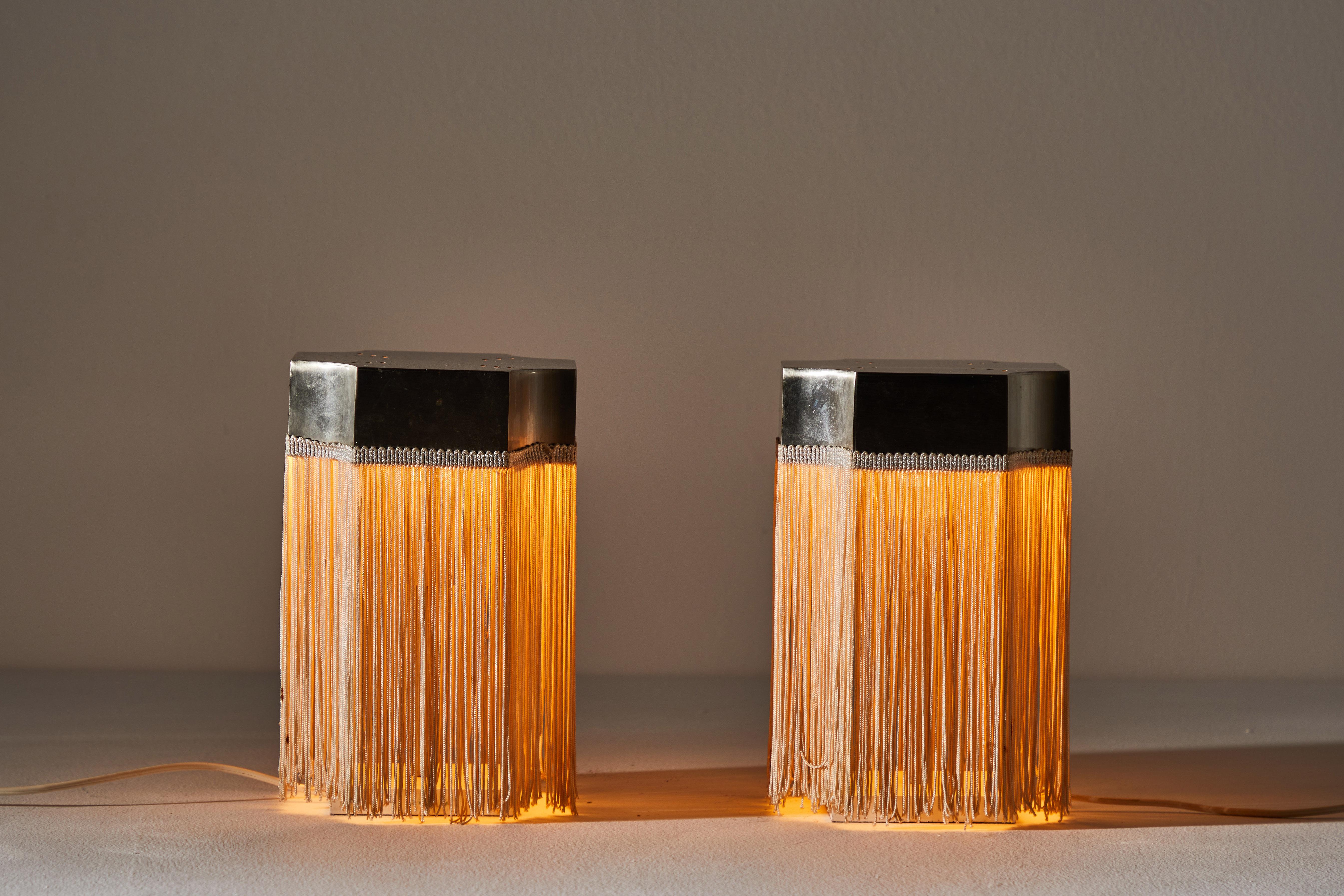 Pair of table lamps by Gianfranco Frattini. Designed and manufactured in Italy, circa 1960s. Aluminum, silk fringe. Original cord. We recommend one E14 40w maximum European candelabra bulb. Bulbs provided as a one time courtesy.