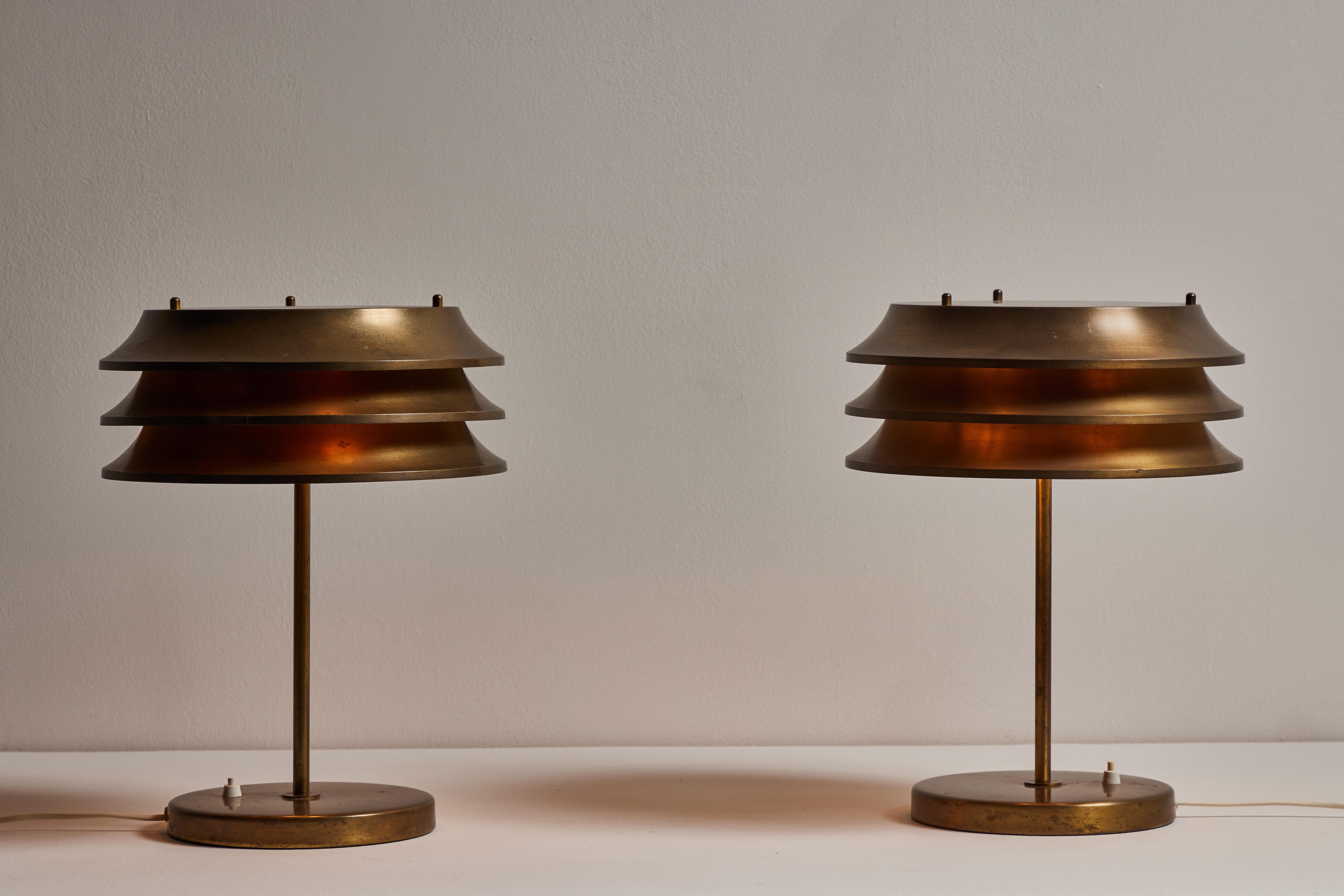 Pair of table lamps Kai Ruokonen for Lynx Edition. Designed and manufactured in Finland, circa 1960s. Brass. Original European cords. We recommend one E27 60w maximum bulb per fixture. Bulbs provided as a one time courtesy. Priced and sold as a pair