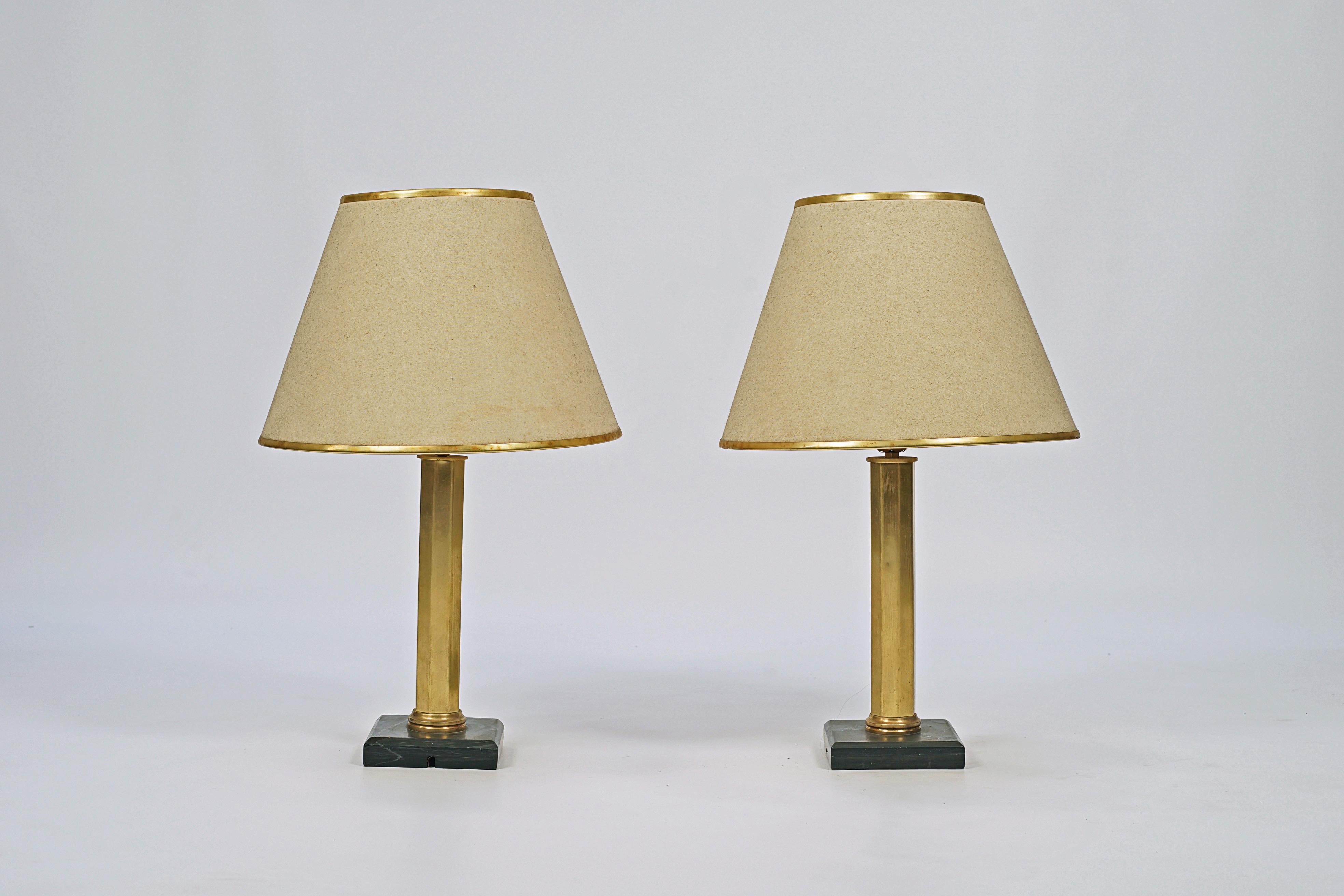 Pair of table lamps designed by Maison Jansen. Bronze structure and belgian black marble base.

France, CIRCA 1940.
