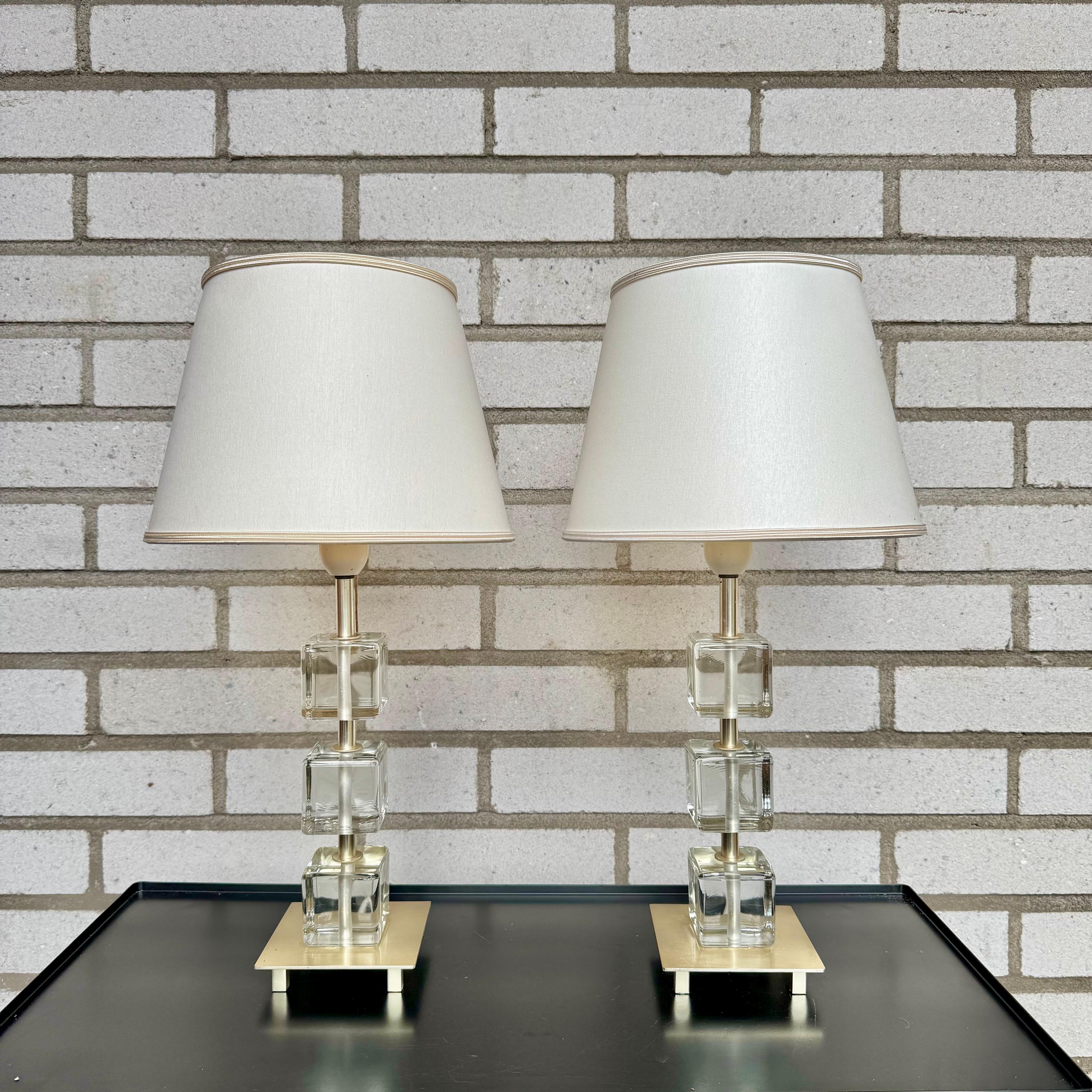 Pair of rare table lamps by Malmö Metallvarufabrik. Lamp shades are included and the height is with the lamp shades. 

