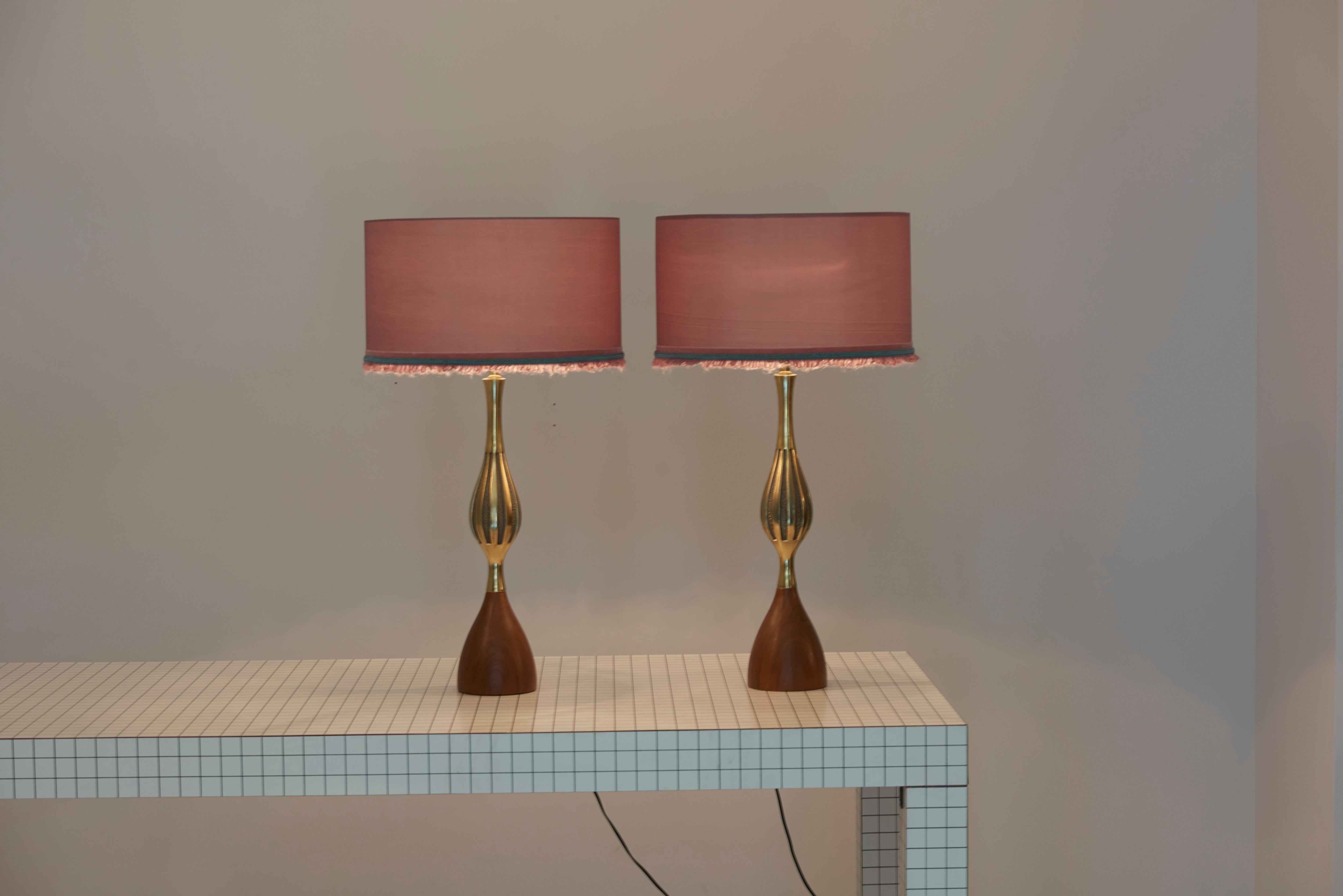 Pair of large table lamps in brass and walnut, designed by Tony Paul and manufactured by Westwood Lighting.
Including new custom lampshades.

1 x E27 socket / each.

Please note: Lamp should be fitted professionally in accordance to local