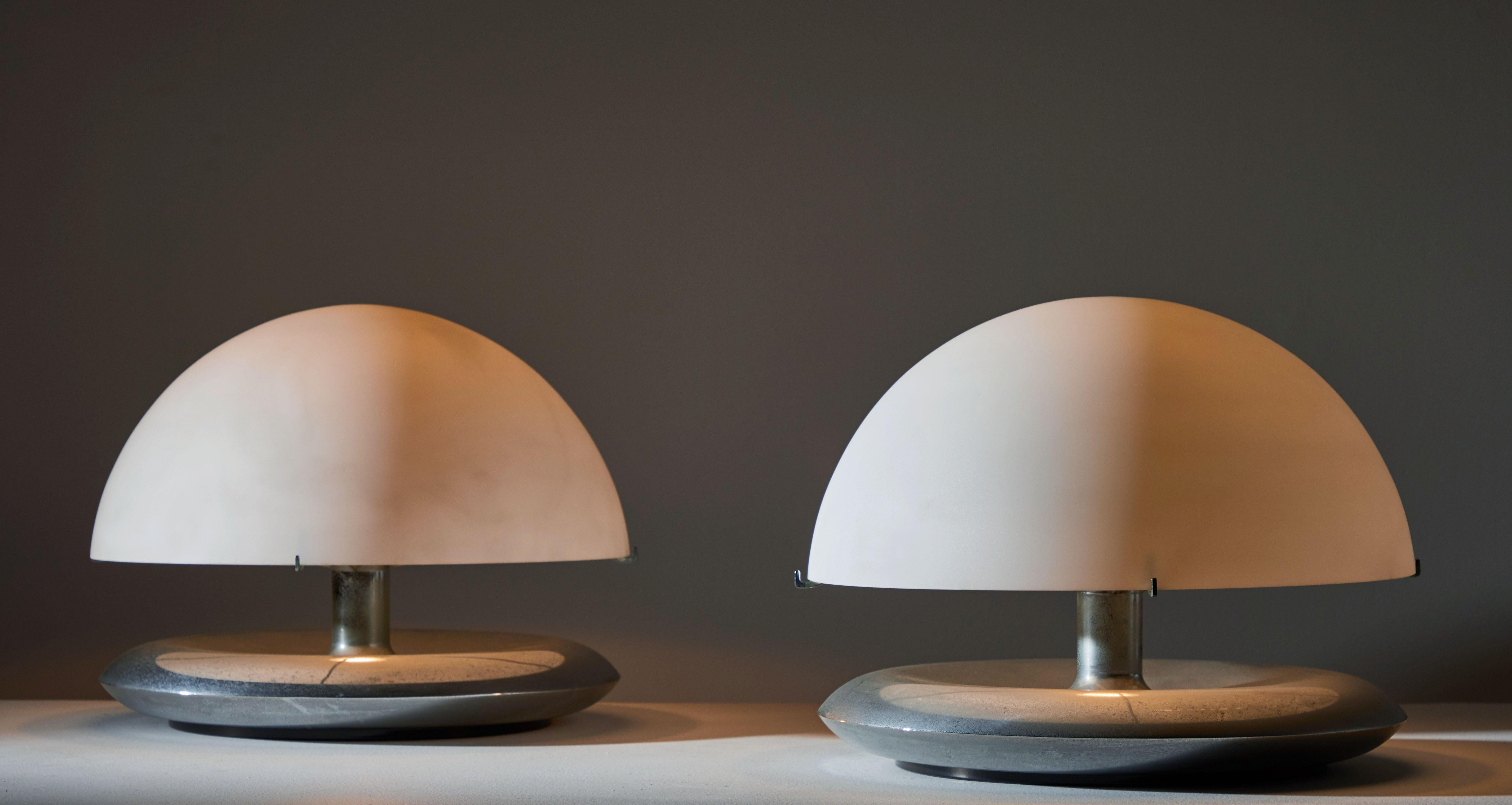 Pair of table lamps. Manufactured in Italy for Venini, circa 1970s. Opaline glass diffusers, with nickel plated brass base. Original cord with on/off hand switch. Takes one E26 75w maximum bulb.