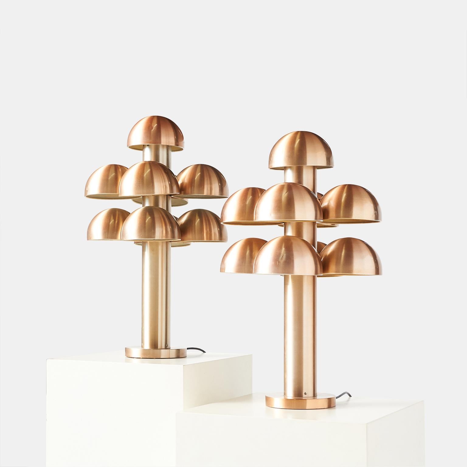 Pair of table lamps “Cantharelle” by Maija Liisa Komulainen for RAAK
An extremely rare and collectible pair of mushroom shaped lamps in anodized aluminum. Each lamp has 9 working sockets with shades.
Made for RAAK in 1972.