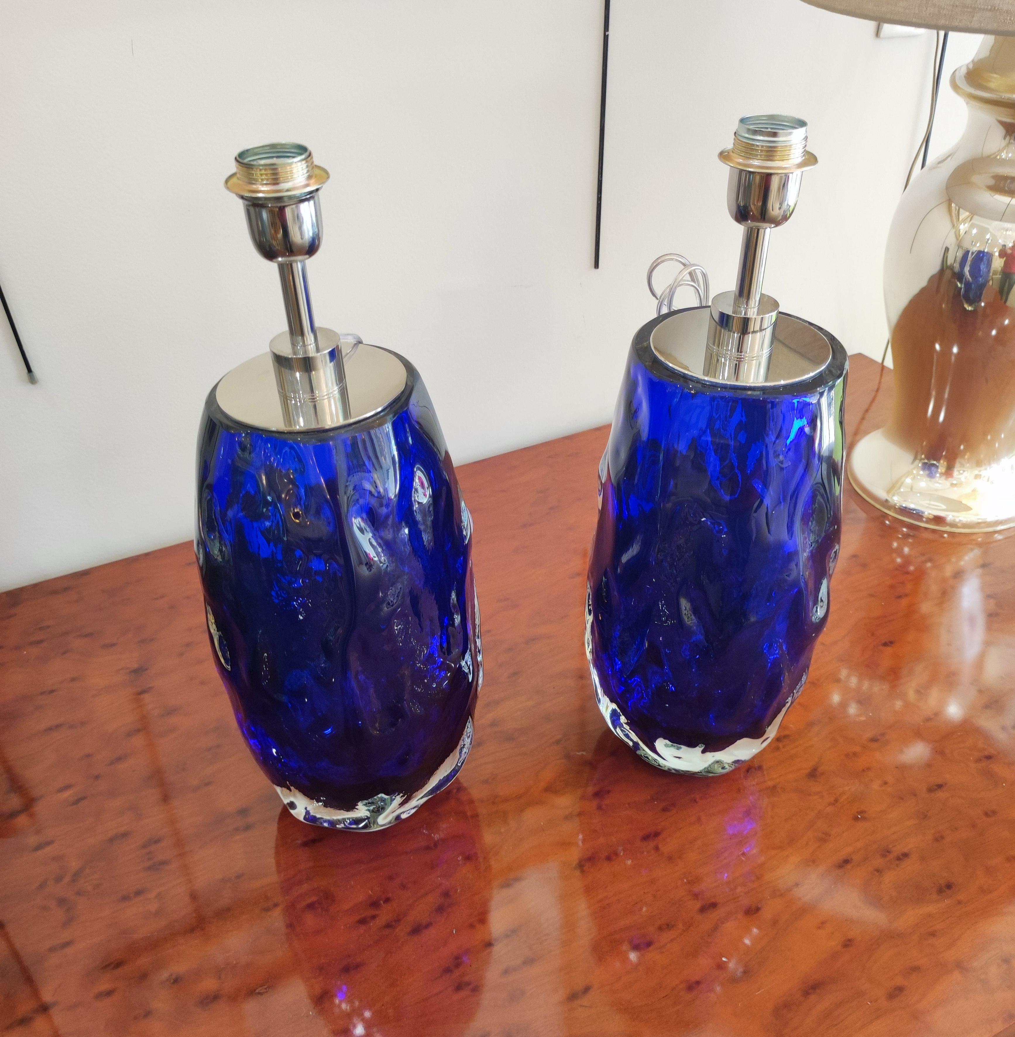 Pair of table lamps in blue Murano glass.



