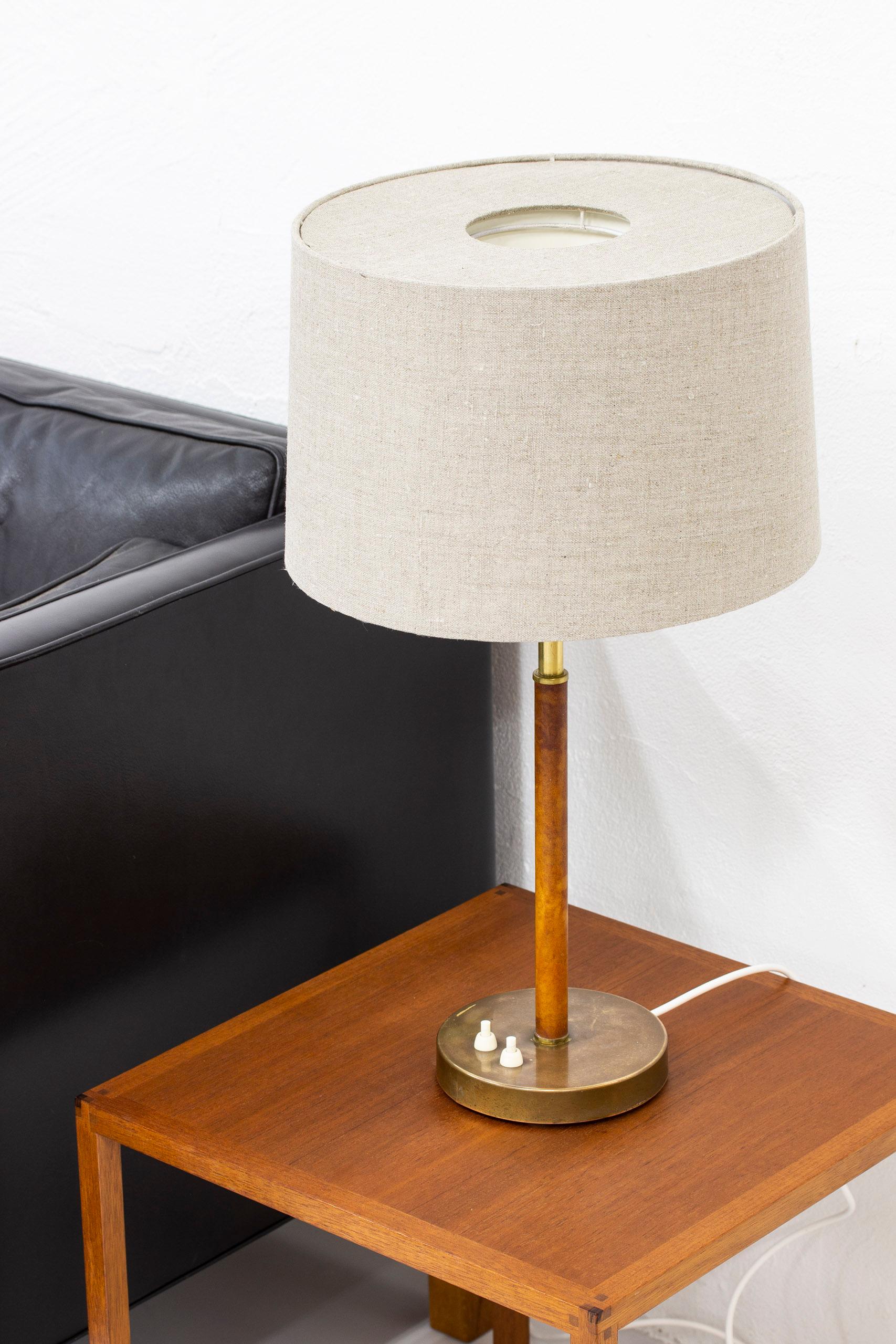 Swedish Pair of Table Lamps in Brass and Original Leather by Bertil Brisborg, NK, Sweden