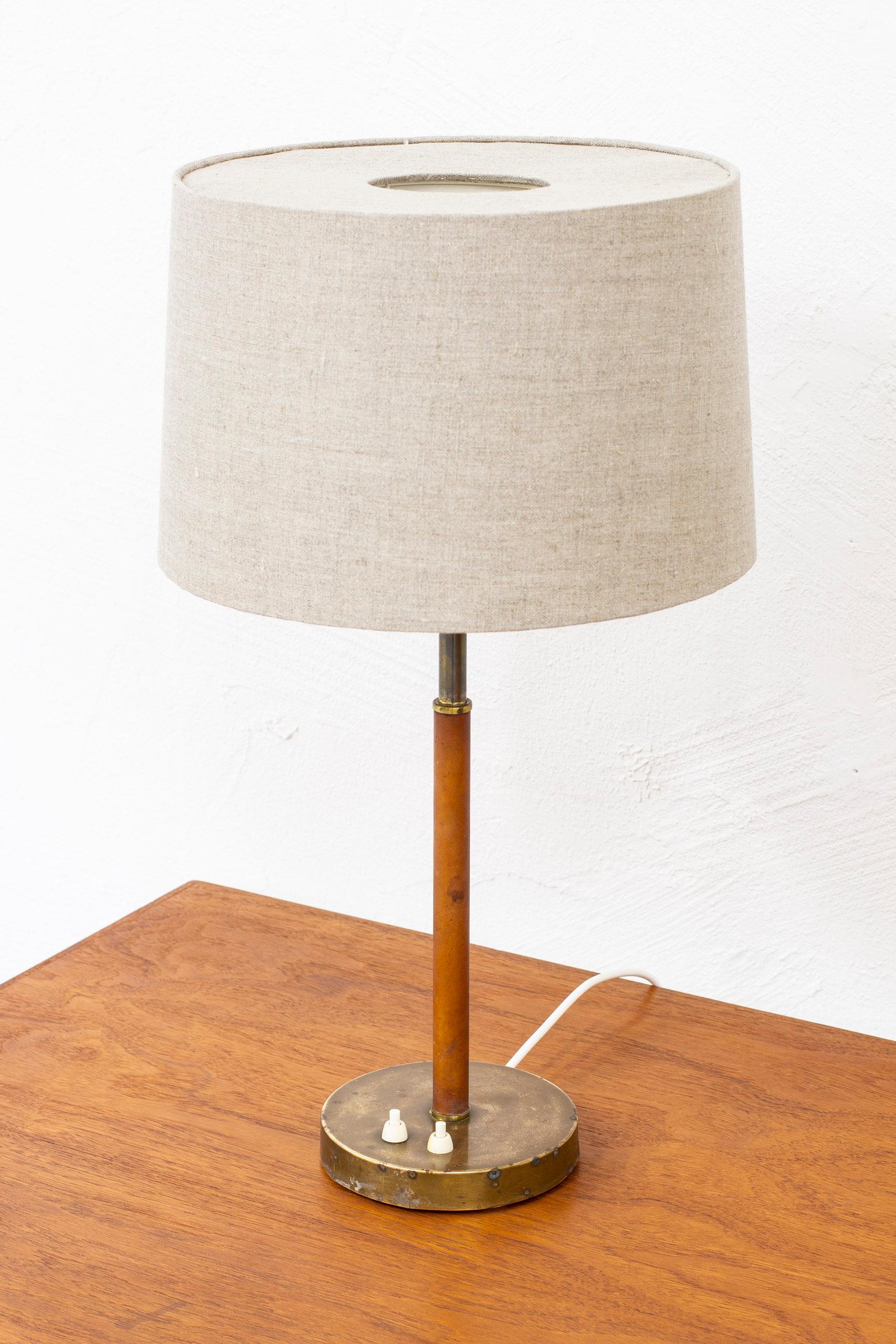 Linen Pair of Table Lamps in Brass and Original Leather by Bertil Brisborg, NK, Sweden