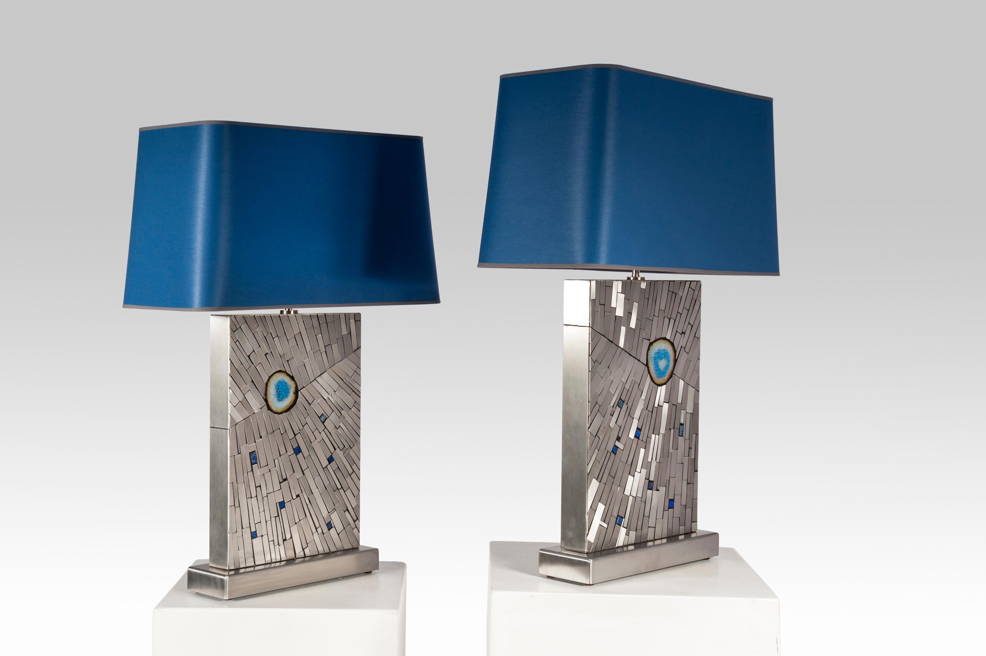 Created to measure by Stan Usel, this pair detail of stainless steel, table lamps topped with a magnificent lapis lazuli and agates gemstone highlighting a mosaic radiation. Each piece is topped with a unique stone and when put together aside gives